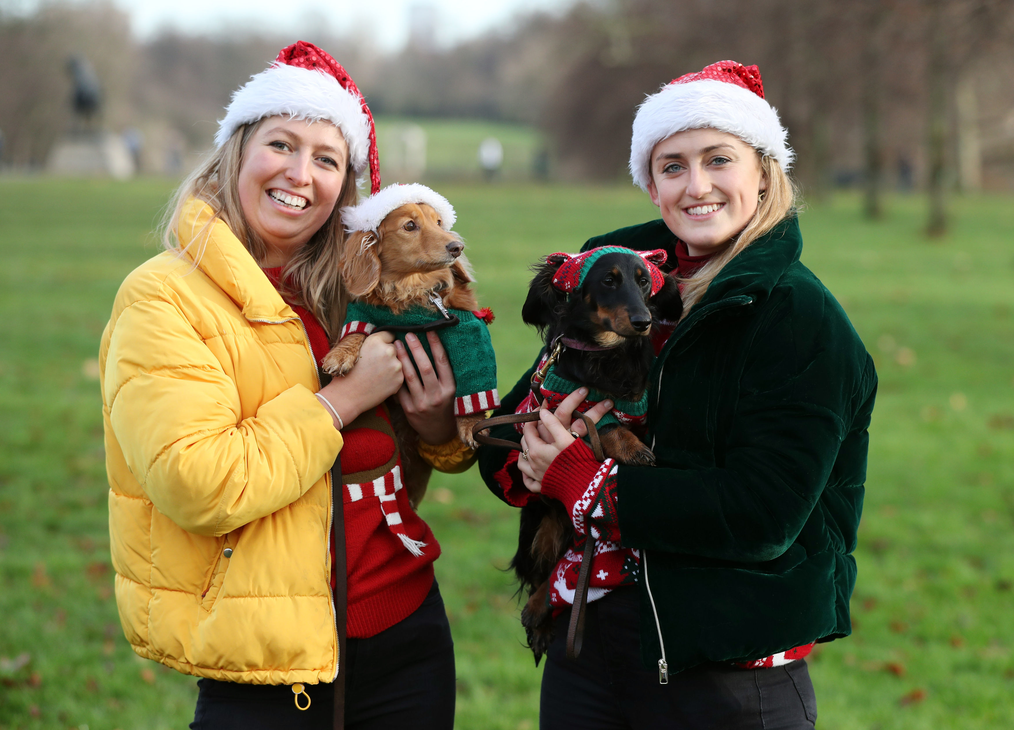 Alice Hancock, left, with her dachshund Nutmeg and Lucy Hughes, right, with her dachshund Twiglet