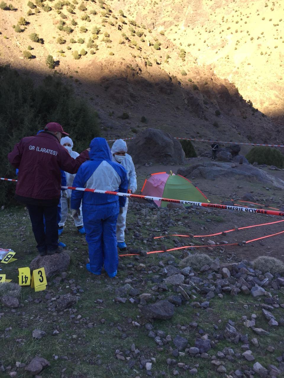 A forensic team where the bodies of two Scandinavian women tourists were found near Imlil in the Atlas Mountains, Morocco