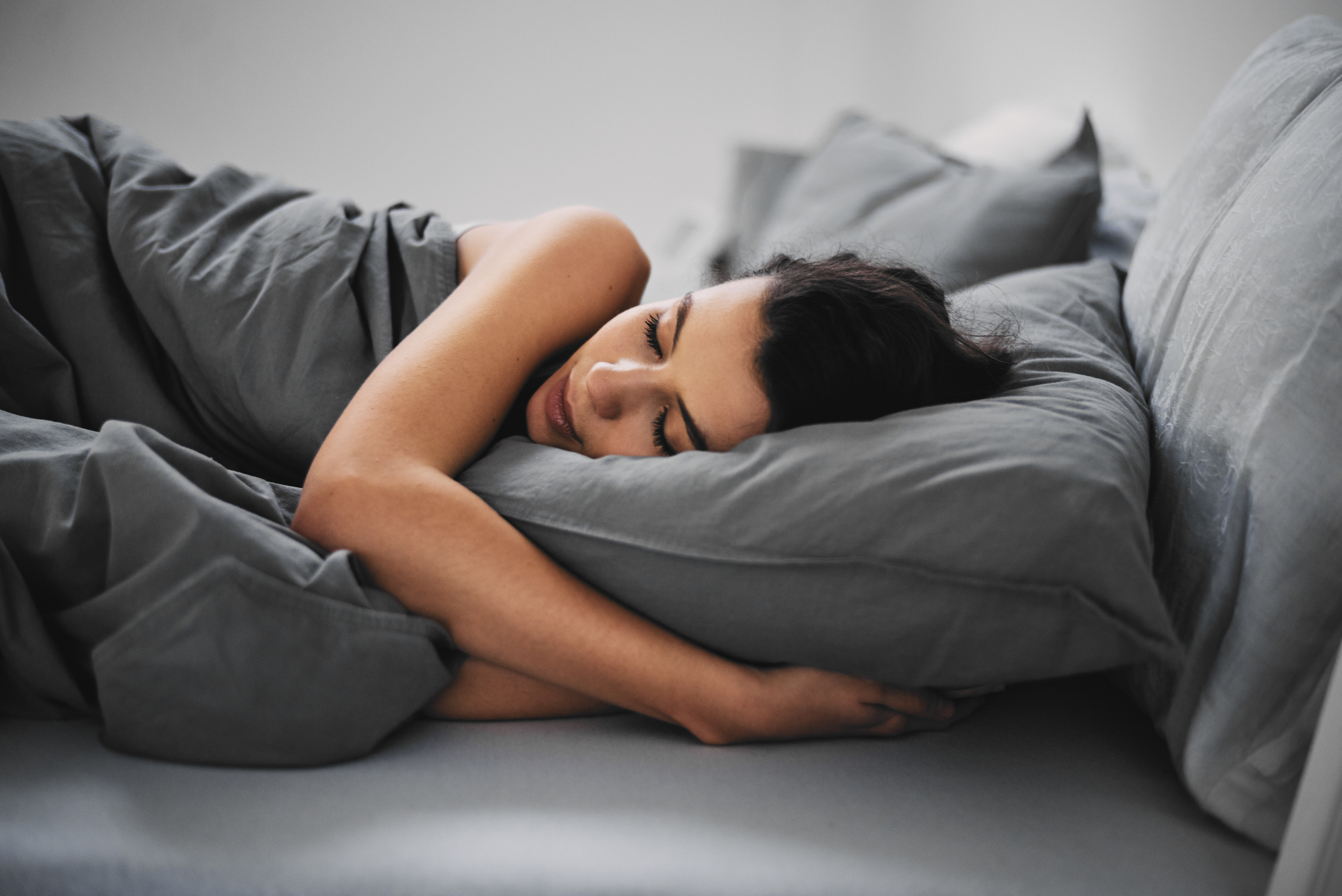 A woman in bed sleeping (Thinkstock/PA)