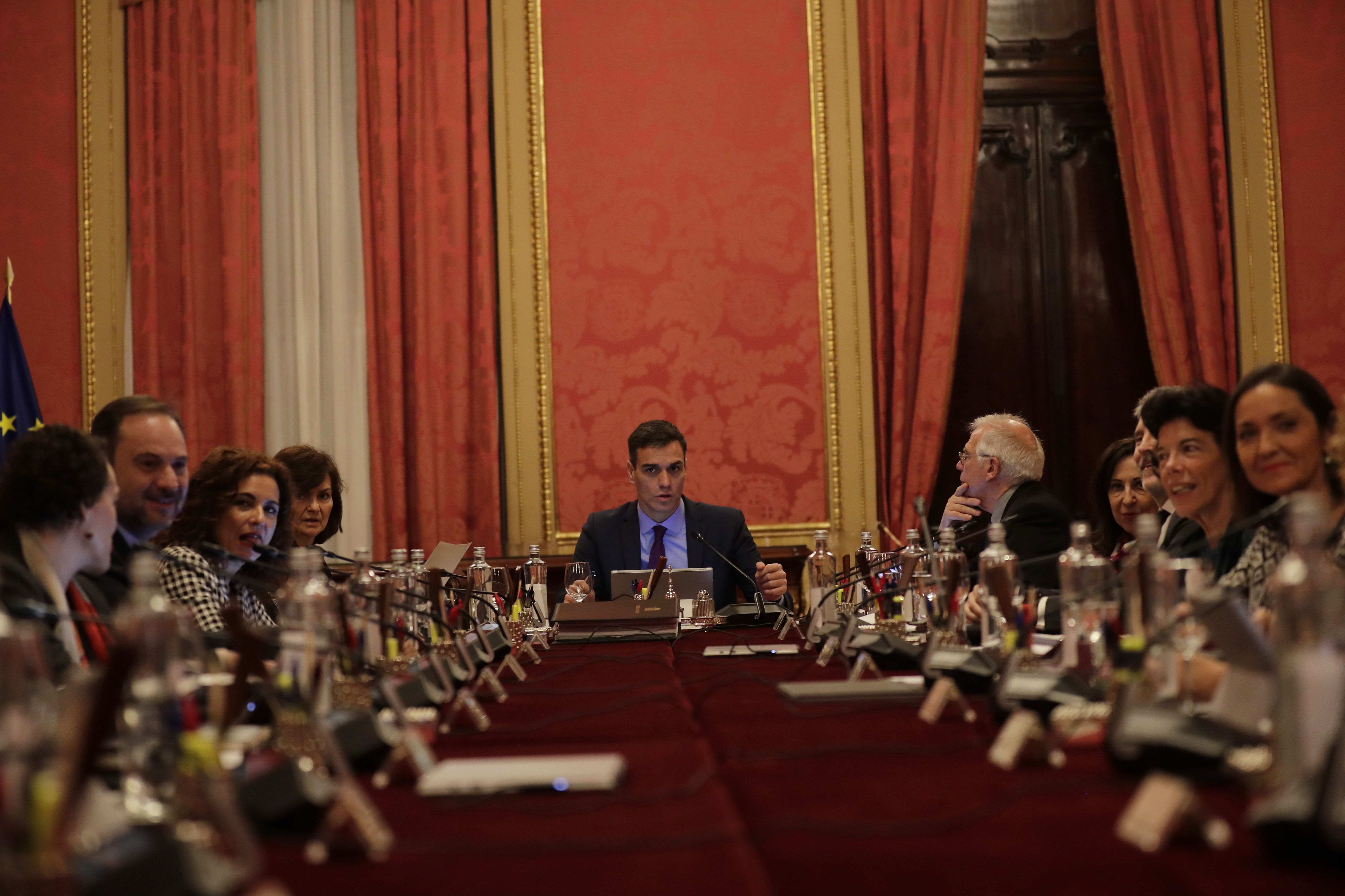 Spain's Prime Minister Pedro Sanchez, centre, presides over a weekly cabinet meeting with government ministers held in Barcelona