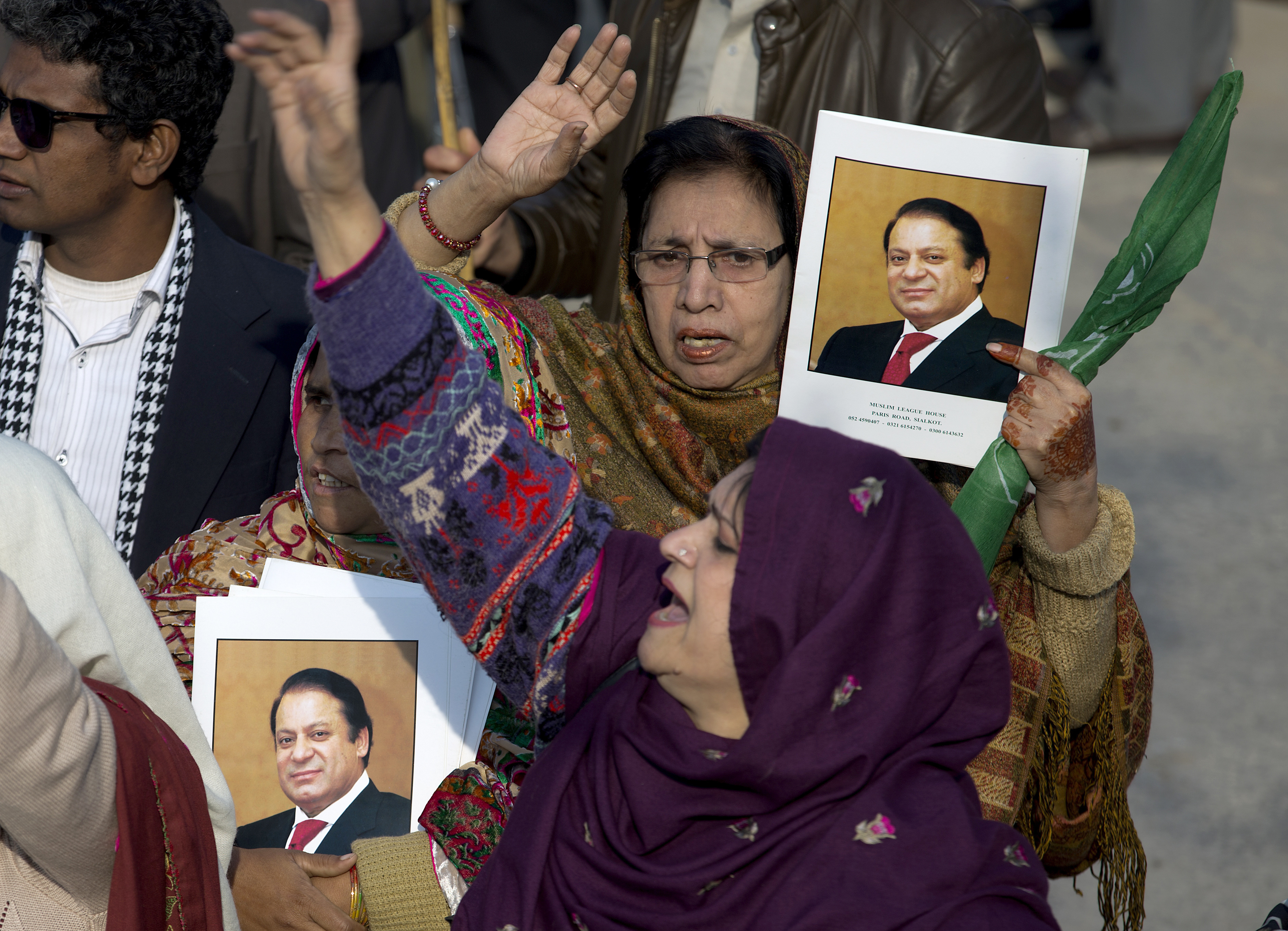 Supporters of Nawaz Sharif shout slogans against the government outside an accountability court in Islamabad