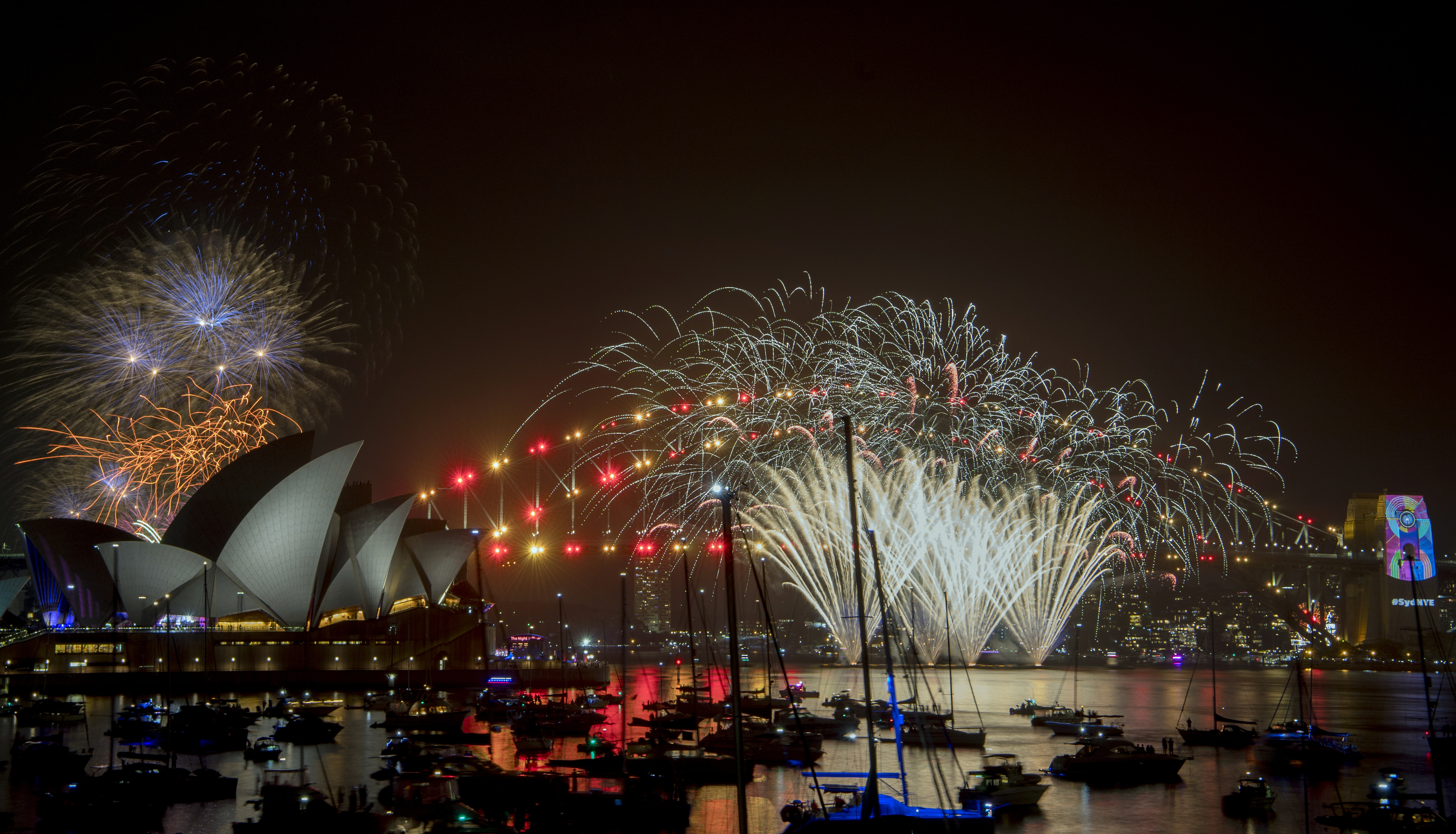 Fireworks explode over the Sydney Harbour during New Year's Eve celebrations in Sydney