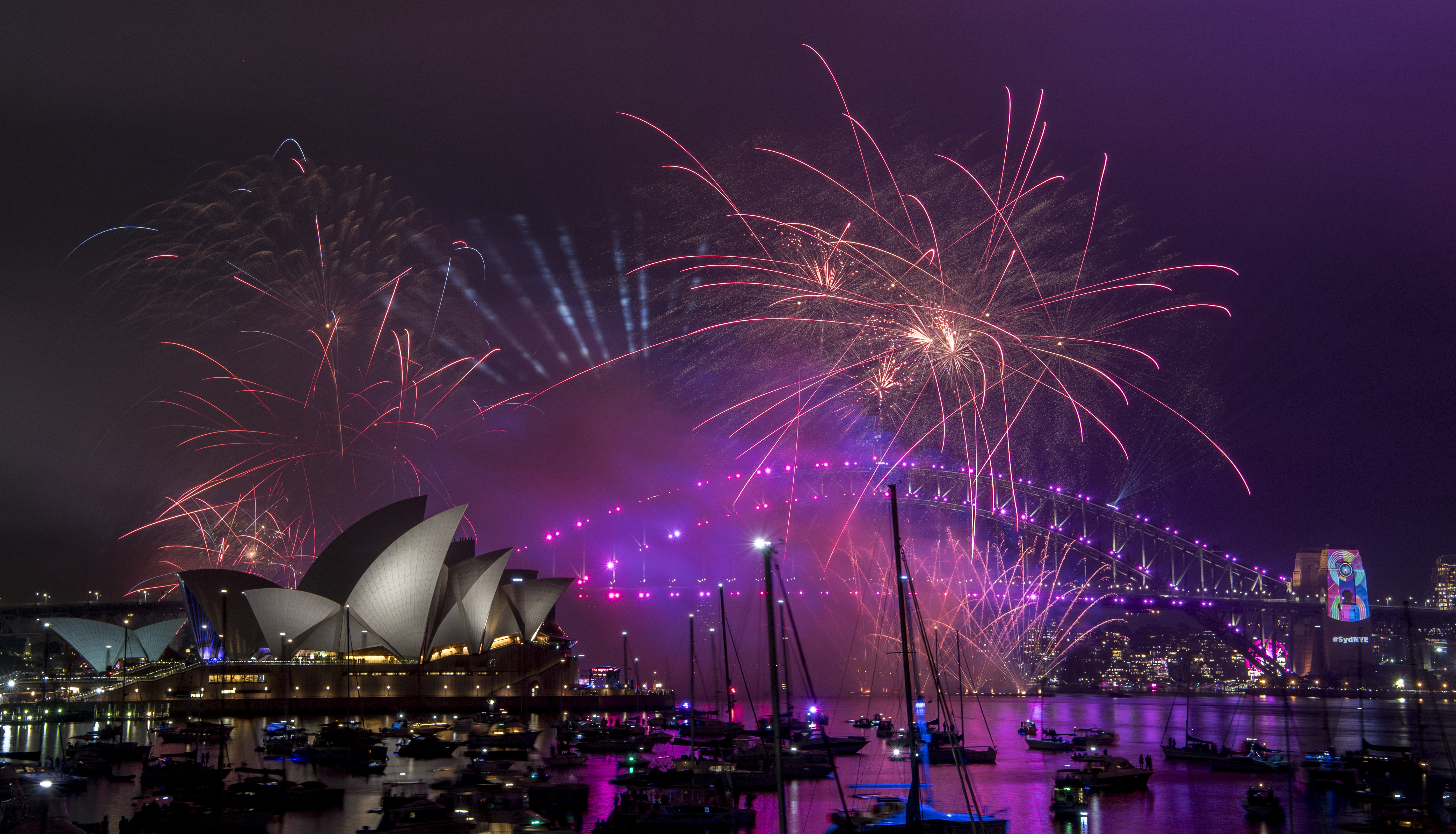 Fireworks explode over the Sydney Harbour 
