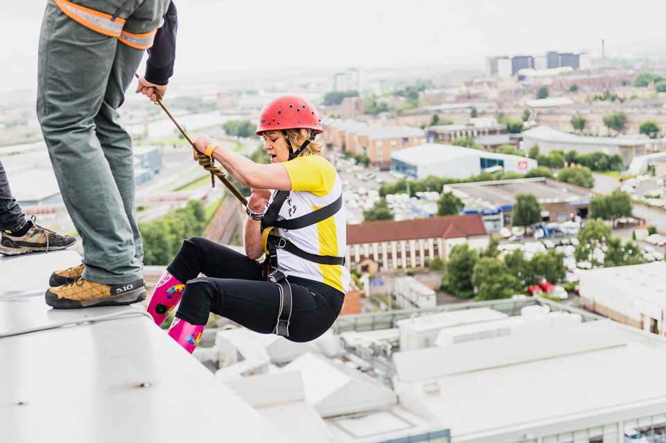 Corinne abseiling