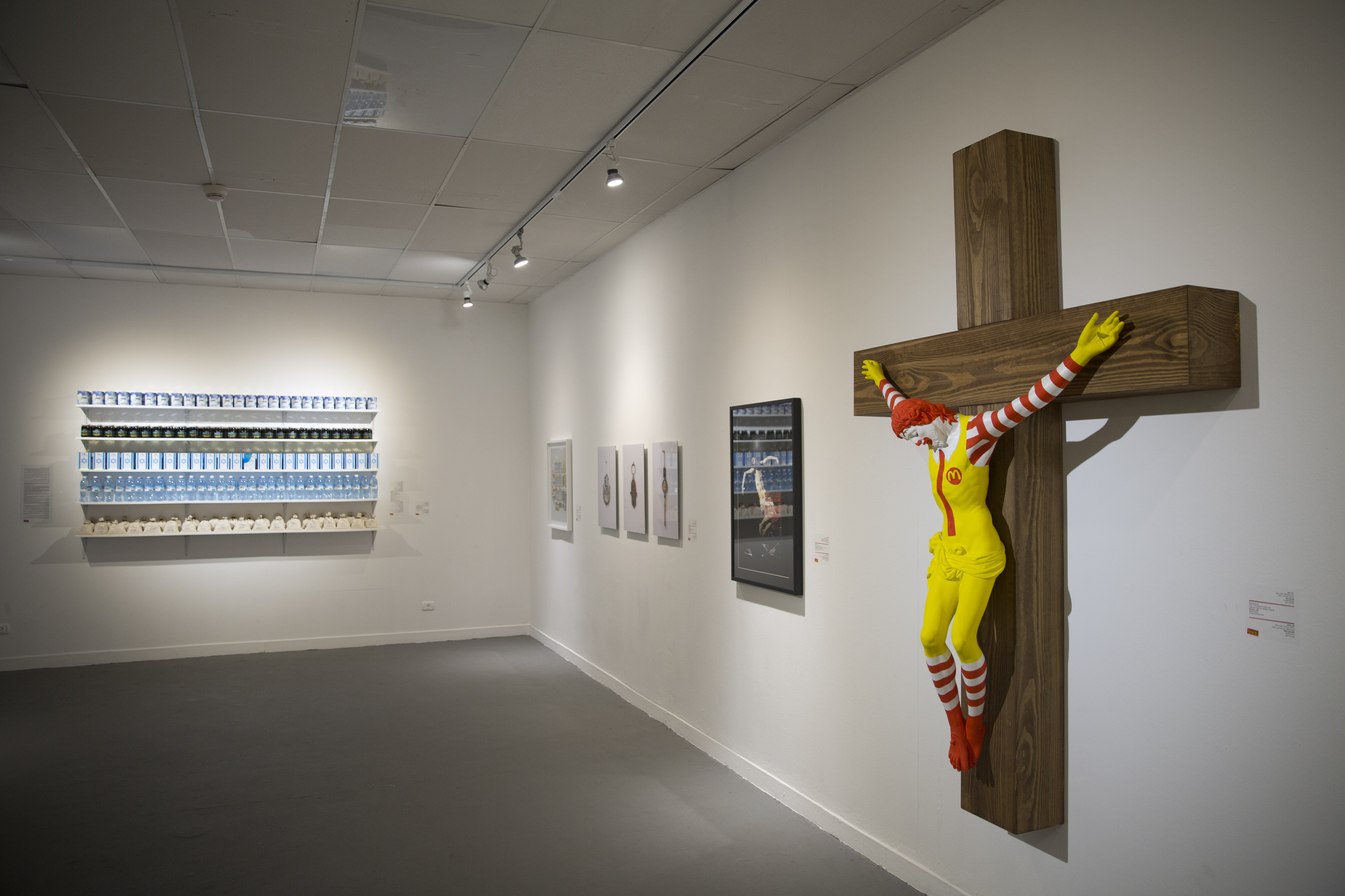 An artwork called McJesus, which was sculpted by Finnish artist Jani Leinonen and depicts a crucified Ronald McDonald, is seen on display as part of the Haifa museum's Sacred Goods exhibit in Haifa, Israel