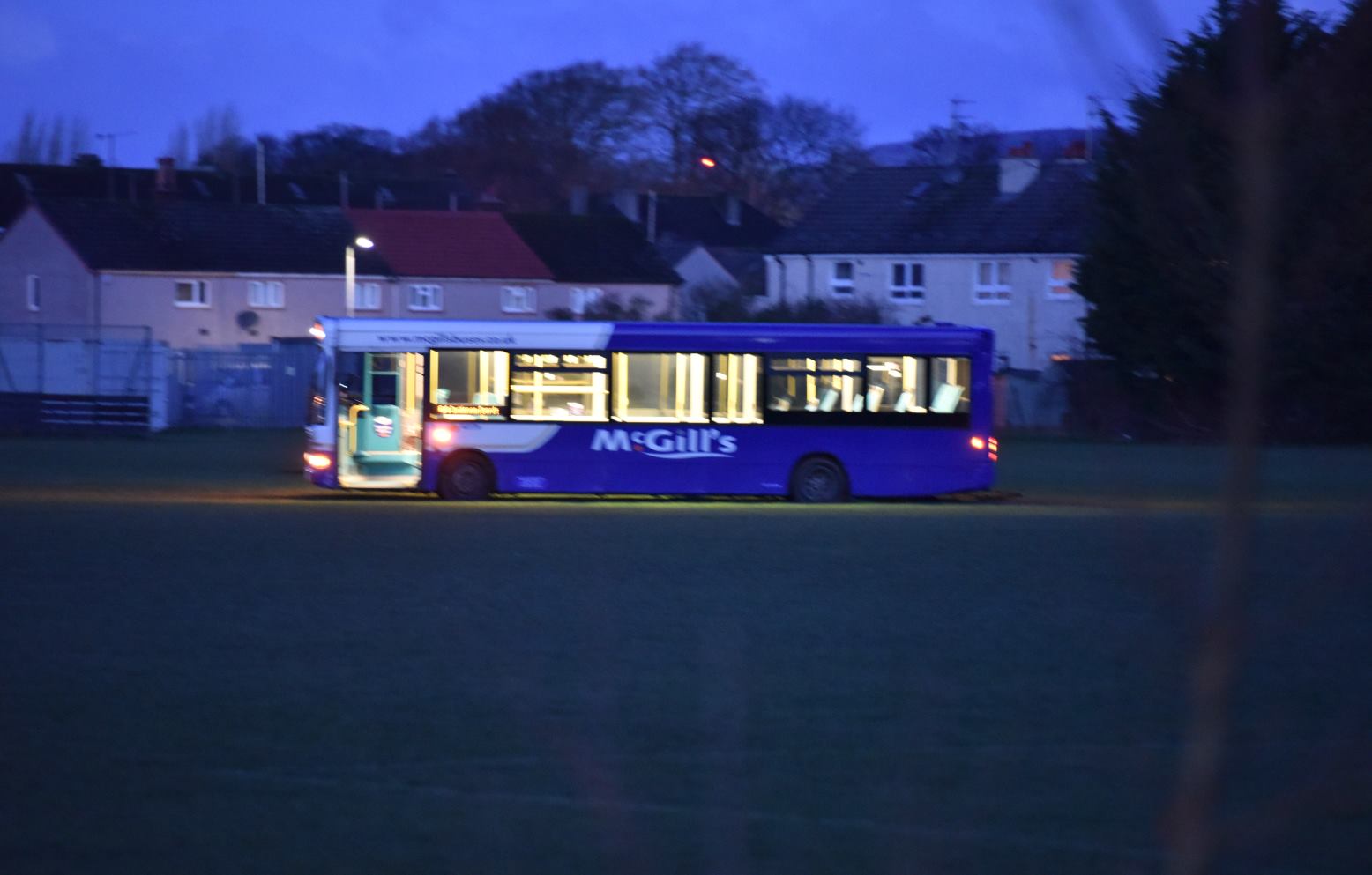 Bus on grass pitch