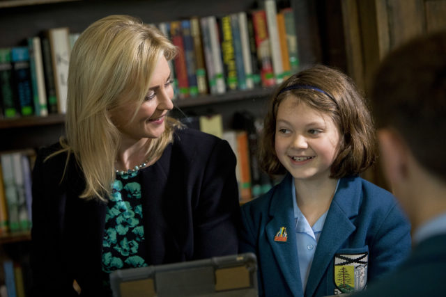 Johanna Urquhart, Principal of Lomond School, with pupils 