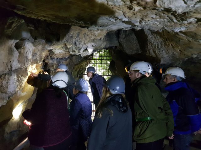 Subterranea Britannica group, observing the witches' marks where the initial discovery was made (Creswell Heritage Trust/PA)
