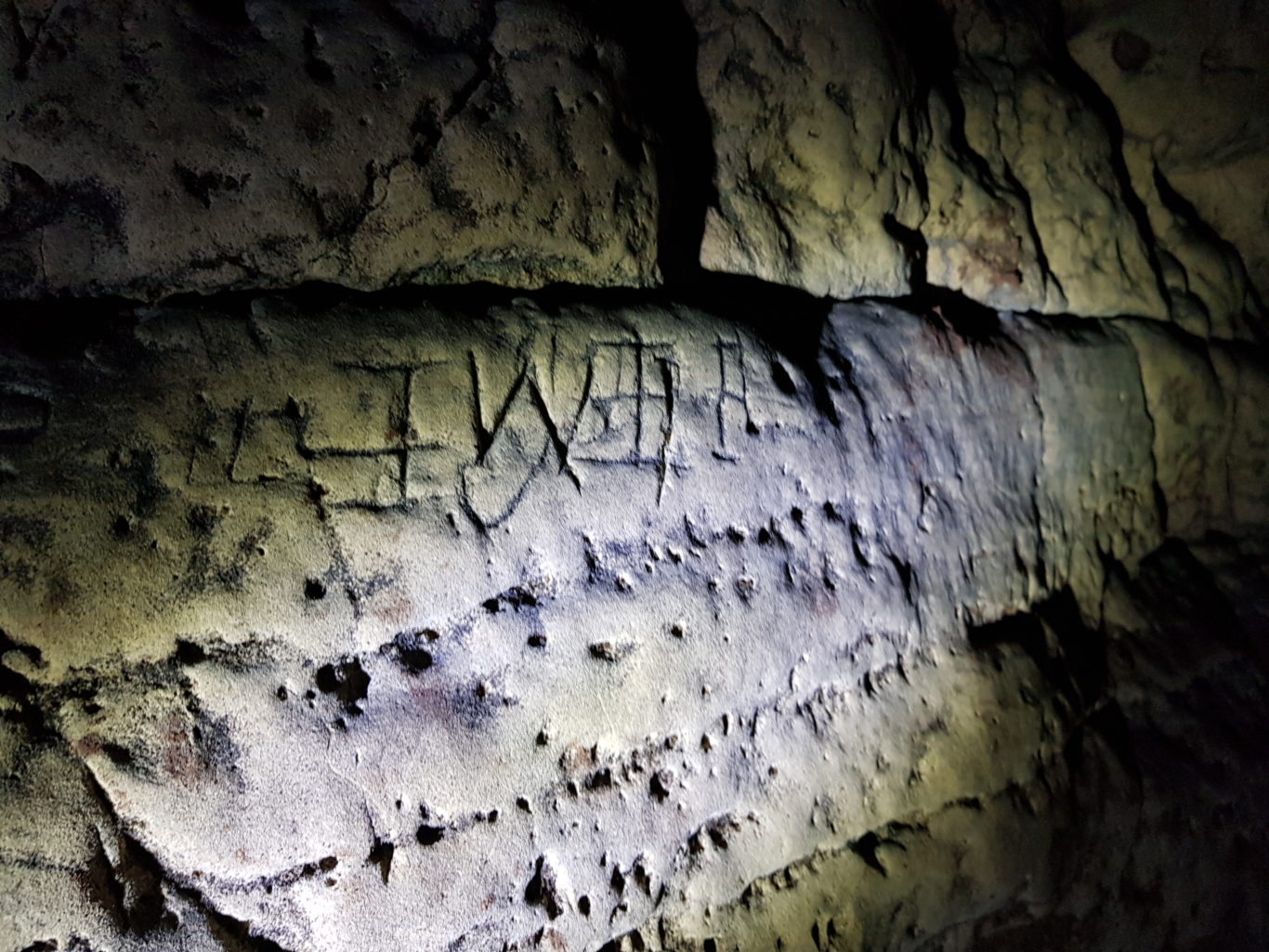 UK’s largest collection of witches’ marks discovered in caves
