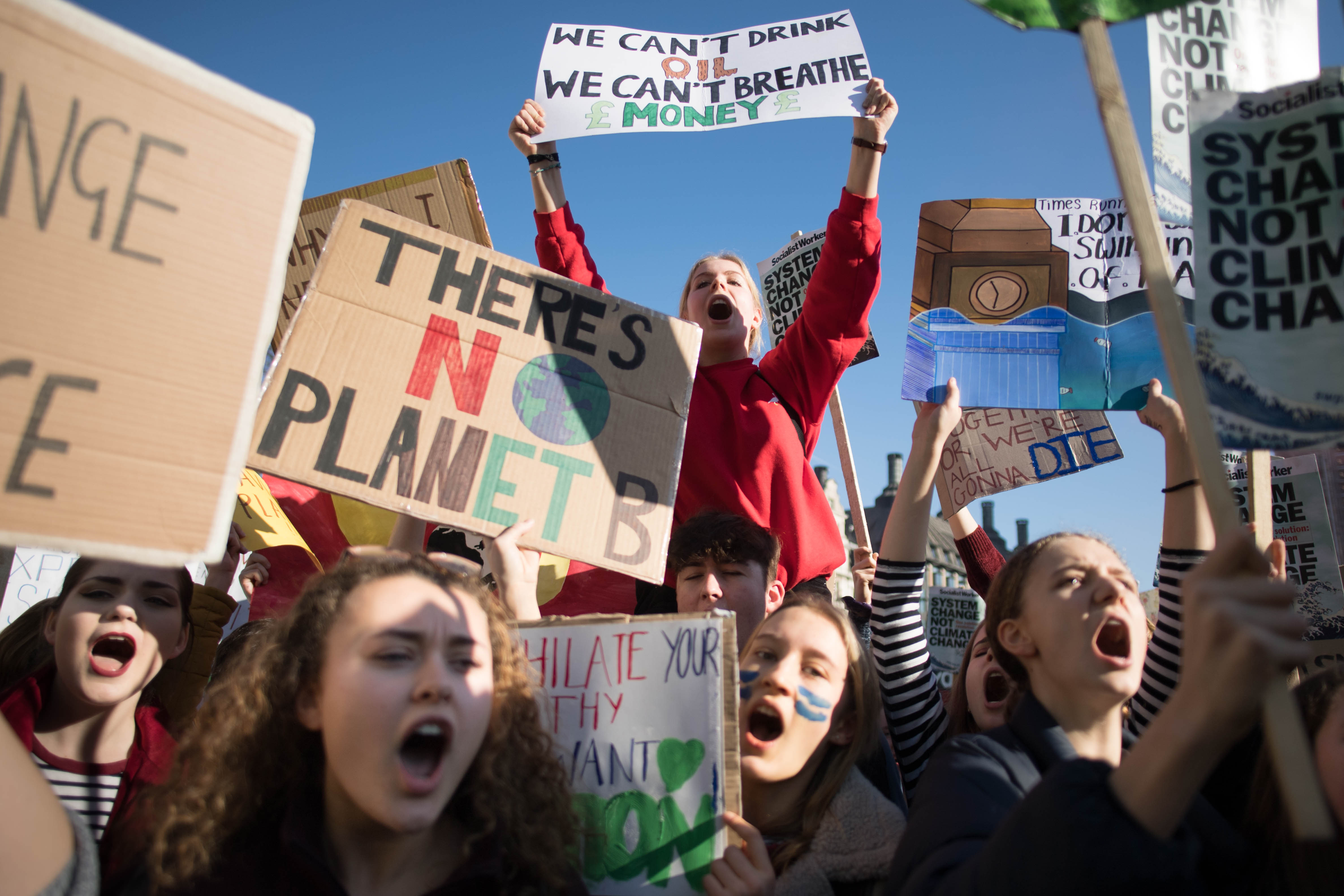 Students from the Youth Strike 4 Climate movement during a climate change protest on Parliament Square in Westminster, London