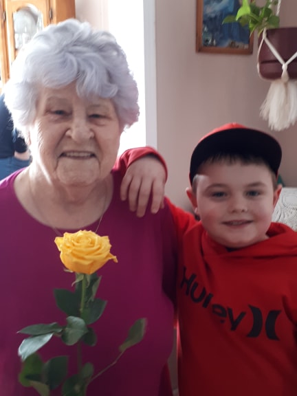 Casey and one of the women with a yellow rose