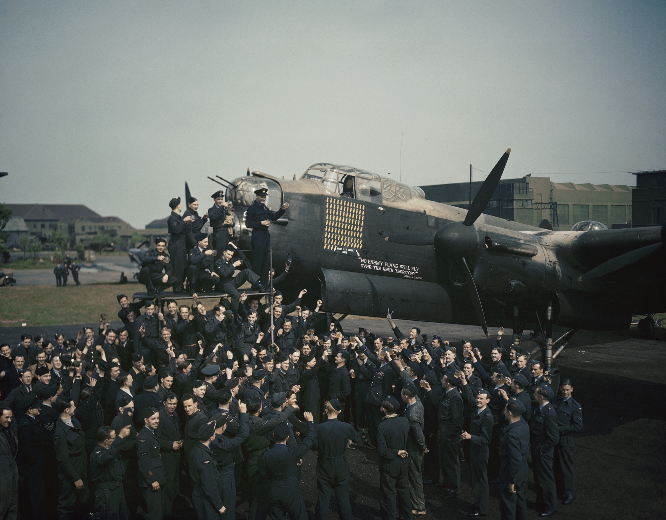 Celebrations at Waddington to mark Lancaster R5868 (S-Sugar) reaching 100 missions while serving with 467 Squadron in May 1944 (IWM/PA)