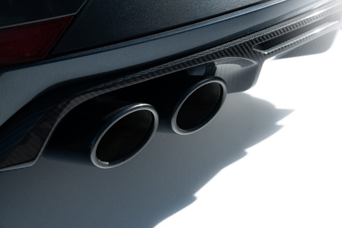 Performance exhausts feature at the rear