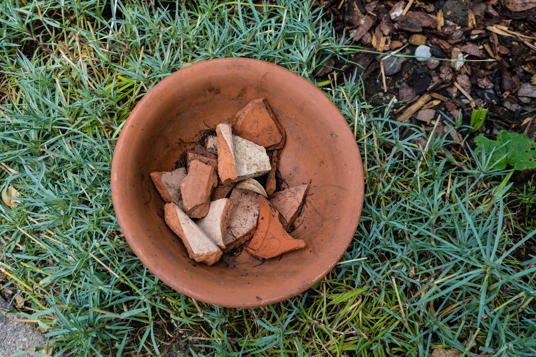 broken terracotta to line the base of pot (iStock/PA)