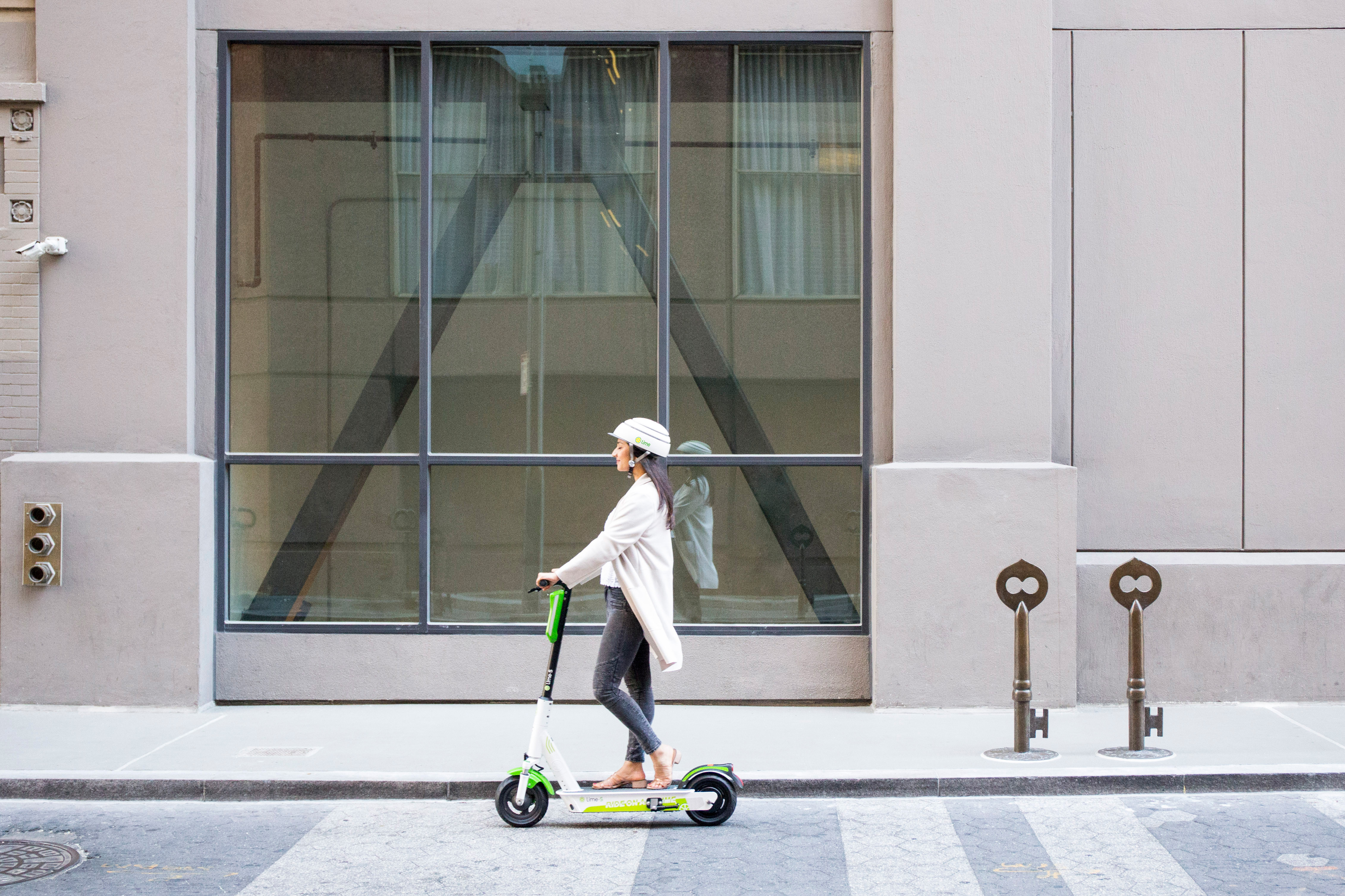 Several firms across the world offer scooters for hire (Lime/PA)