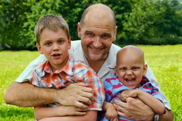 Peter Blandford with two sons 