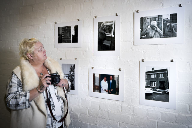 Kathleen O'Rawe with her artwork