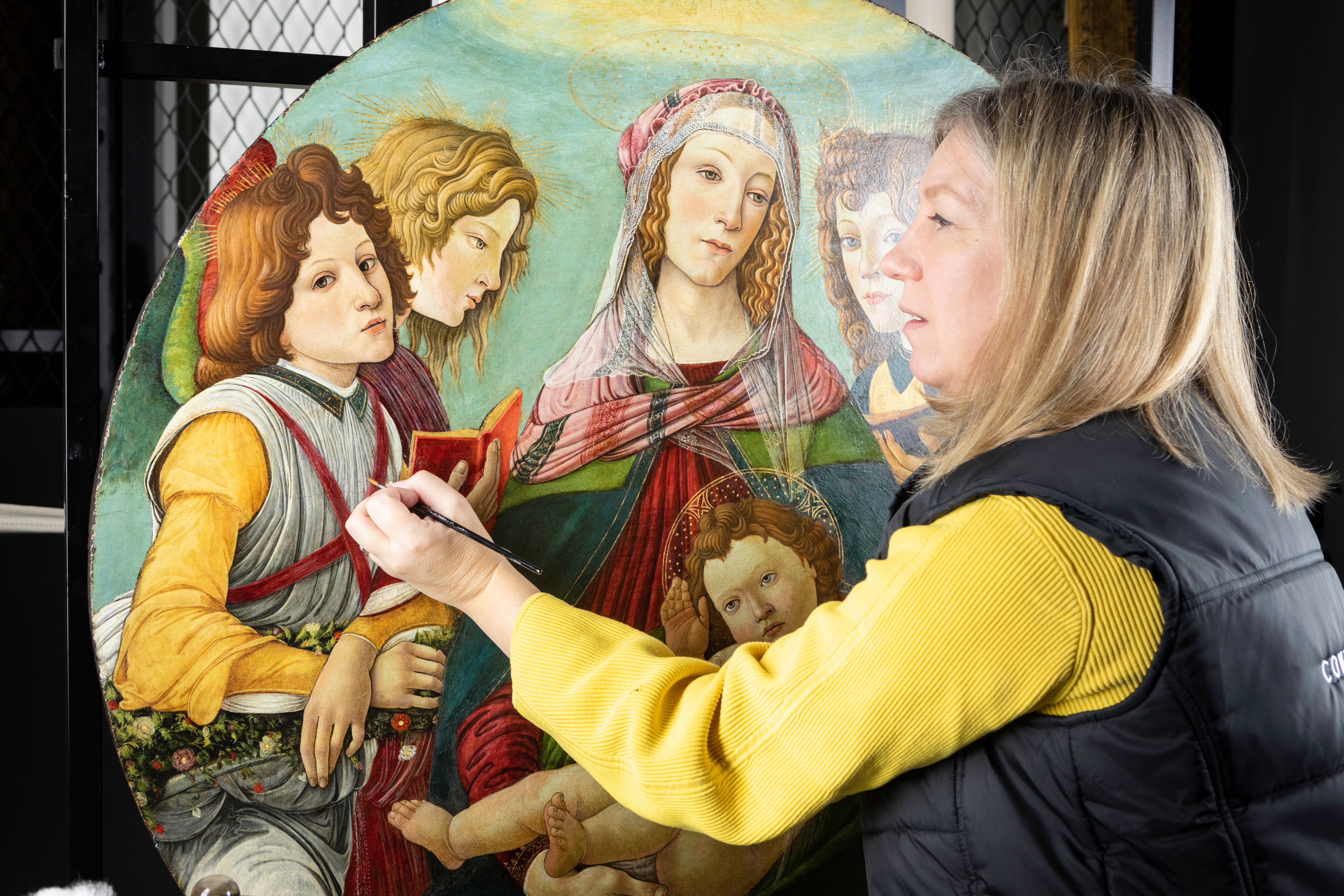 English Heritage Conservator Rachel Turnbull completes the conservation of Madonna Of The Pomegranate