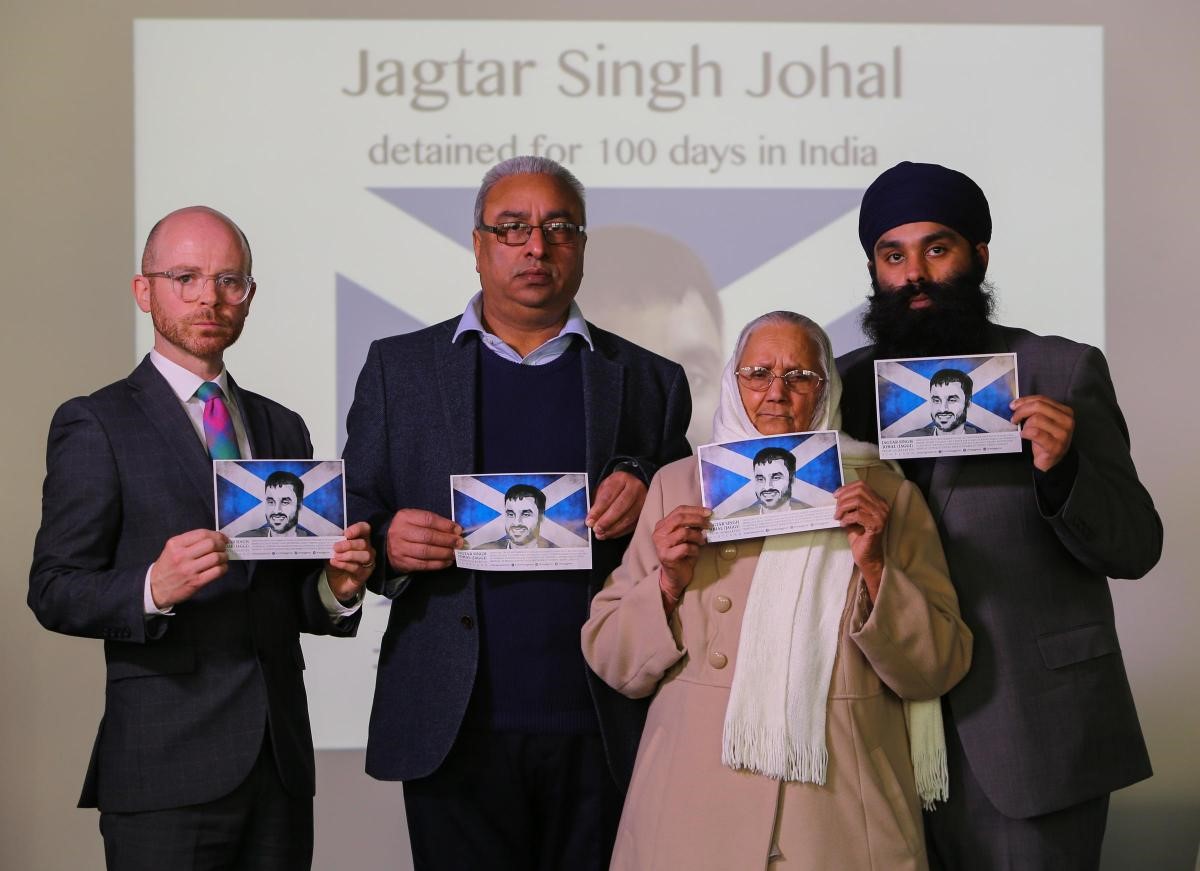 Martin Docherty-Hughes MP alongside family of Jagtar Singh Johal 