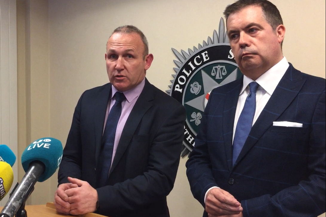 PSNI Detective Chief Inspector David Henderson (left) and Retail NI Chief Executive Glynn Roberts at a press conference at PSNI headquarters (David Young/PA)