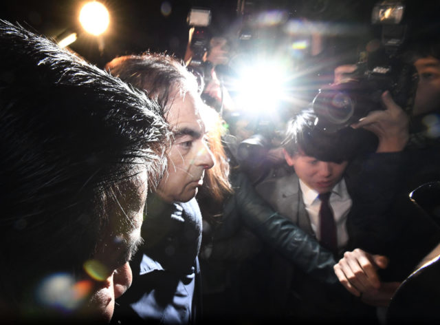 Carlos Ghosn leaves his lawyer's office in Tokyo