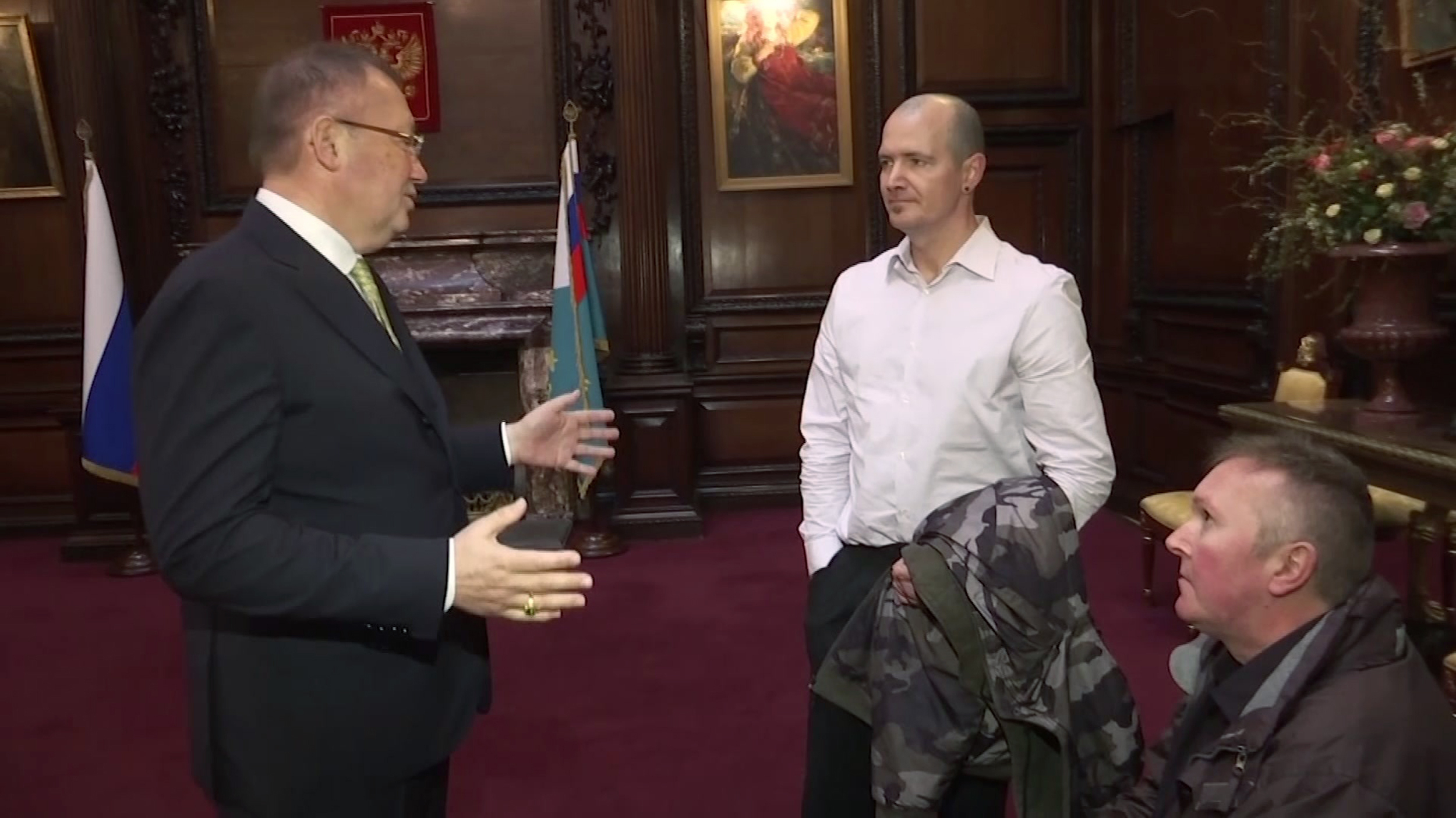 Charlie Rowley and his brother with the Russian ambassador