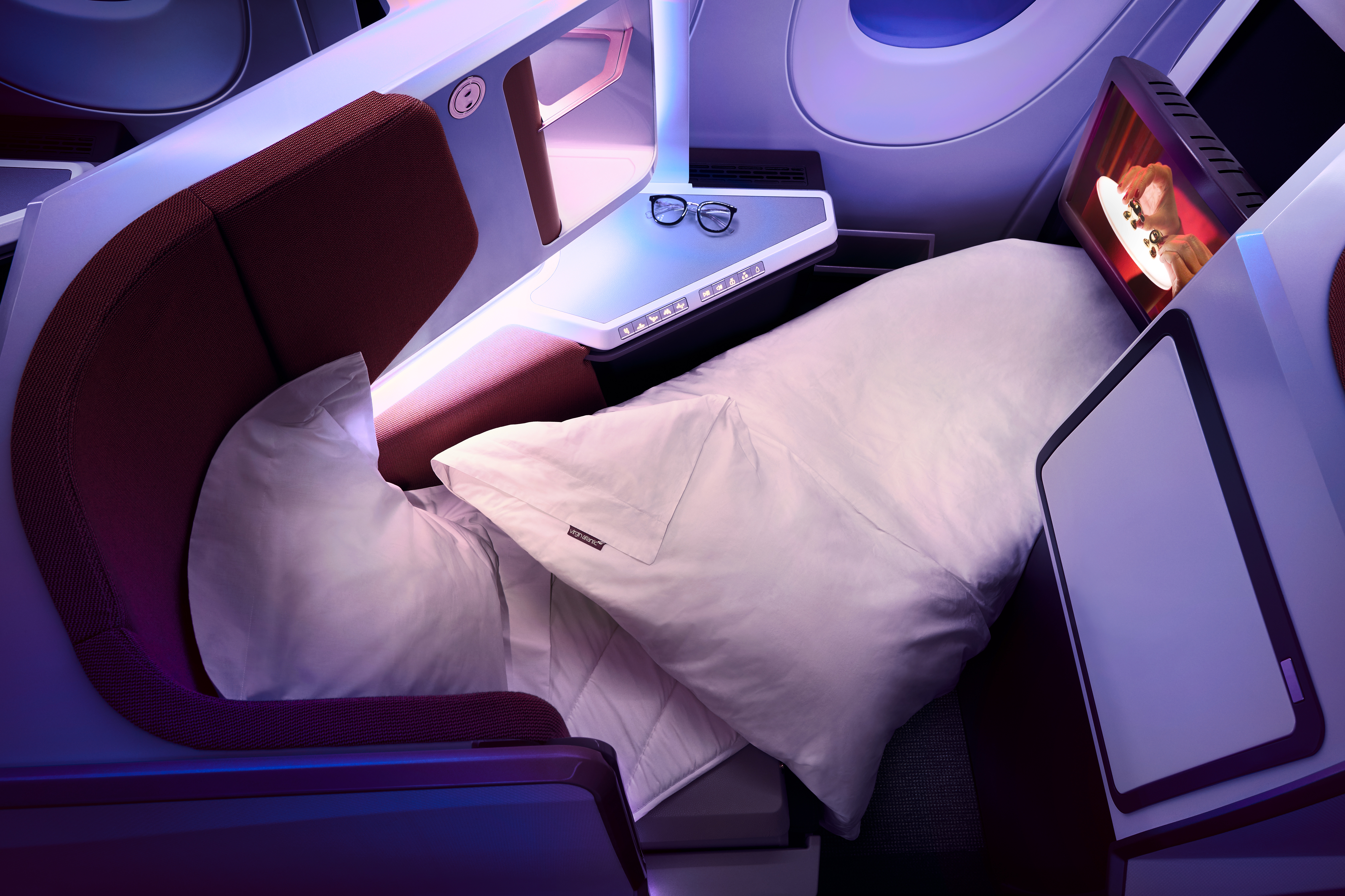 Upper Class seats can be transitioned into a fully flat bed at the touch of a button (Virgin Atlantic/PA)