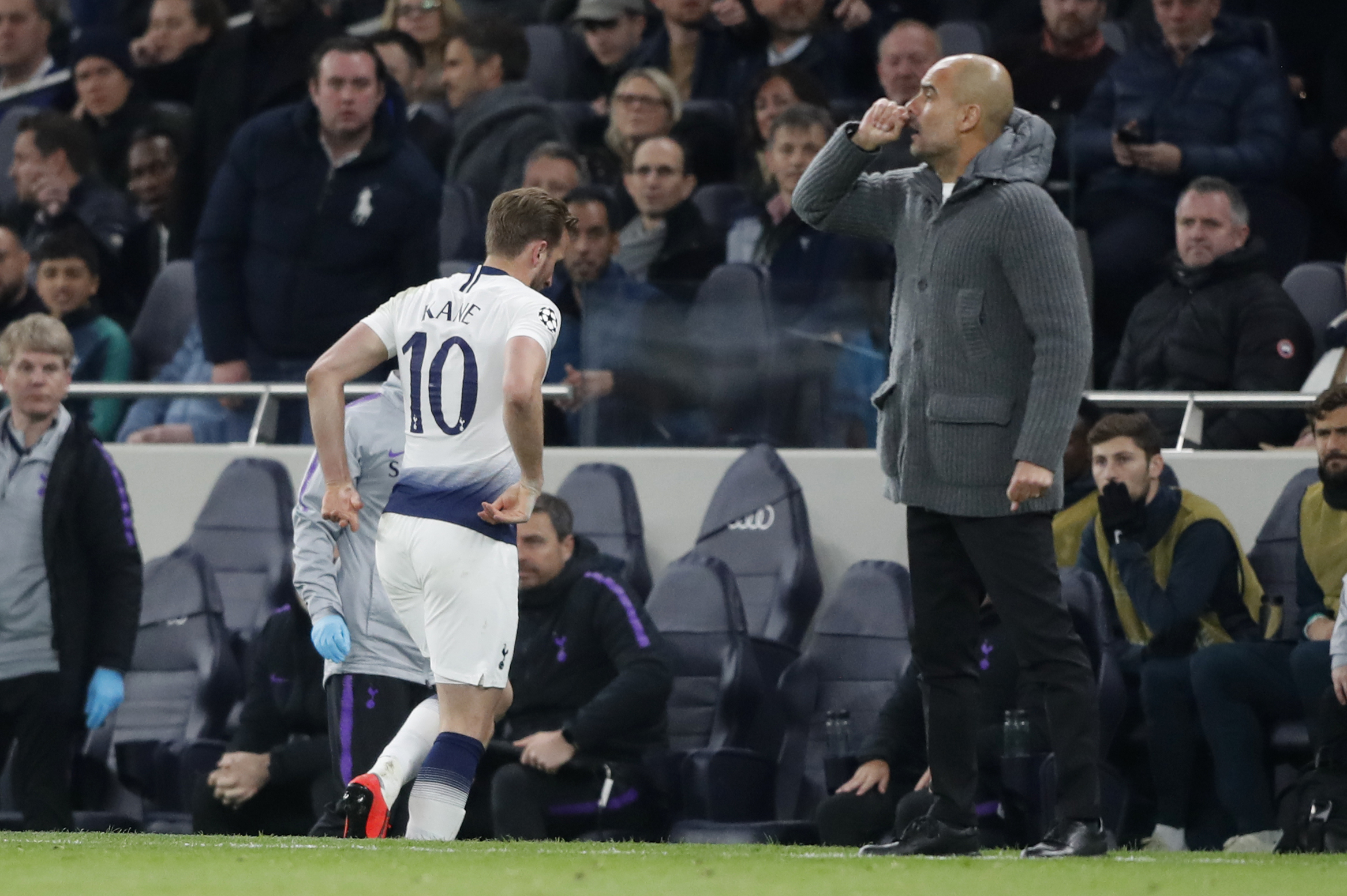 Tottenham's Harry Kane leaves the pitch after picking up an injury against Manchester City in the Champions League