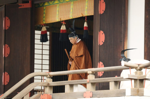 Japan's Emperor Akihito leaves after a ritual to report his abdication to the throne