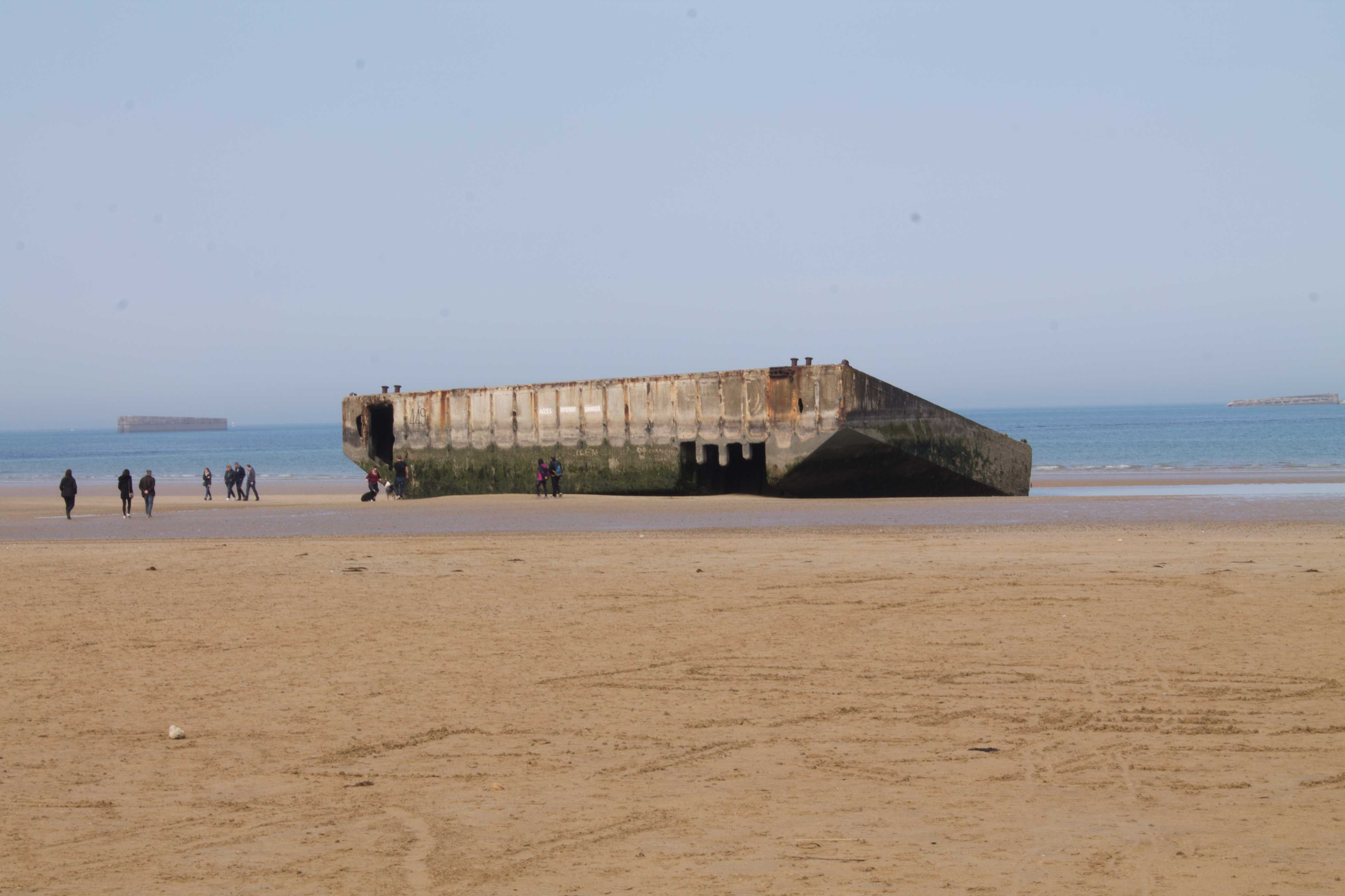 A piece of the British Mulberry harbour washed up on the beach at Arromanches-les-Baines (Jonjo Maudsley/PA)