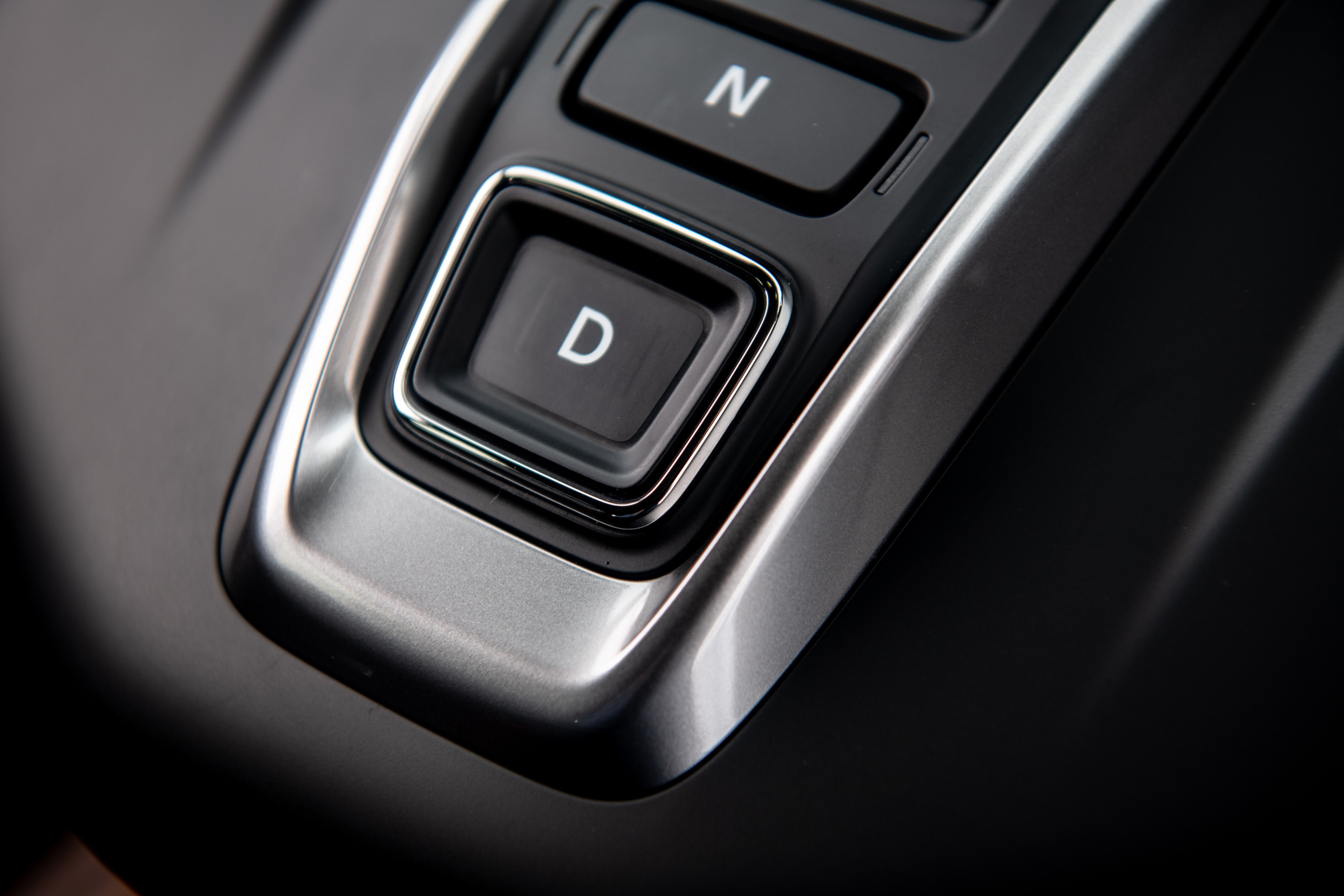 Push-button gears are placed in the centre of the car