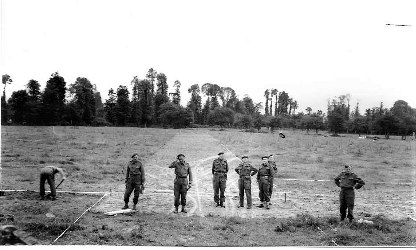 Men of No 32 GRU tape out the outline of Bayeux War Cemetery (CWGC/PA)