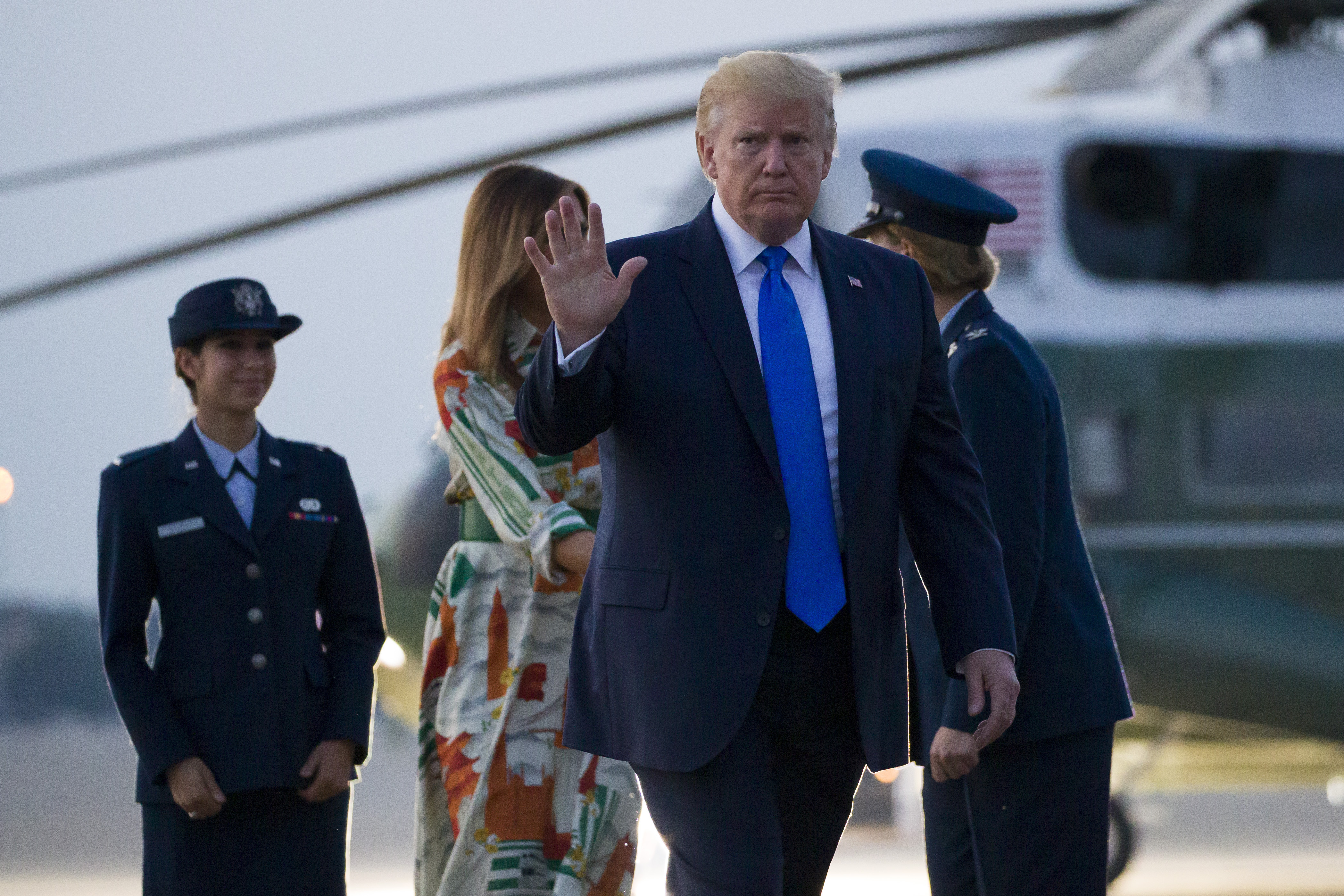 The Trumps board the plane to England in Washington DC