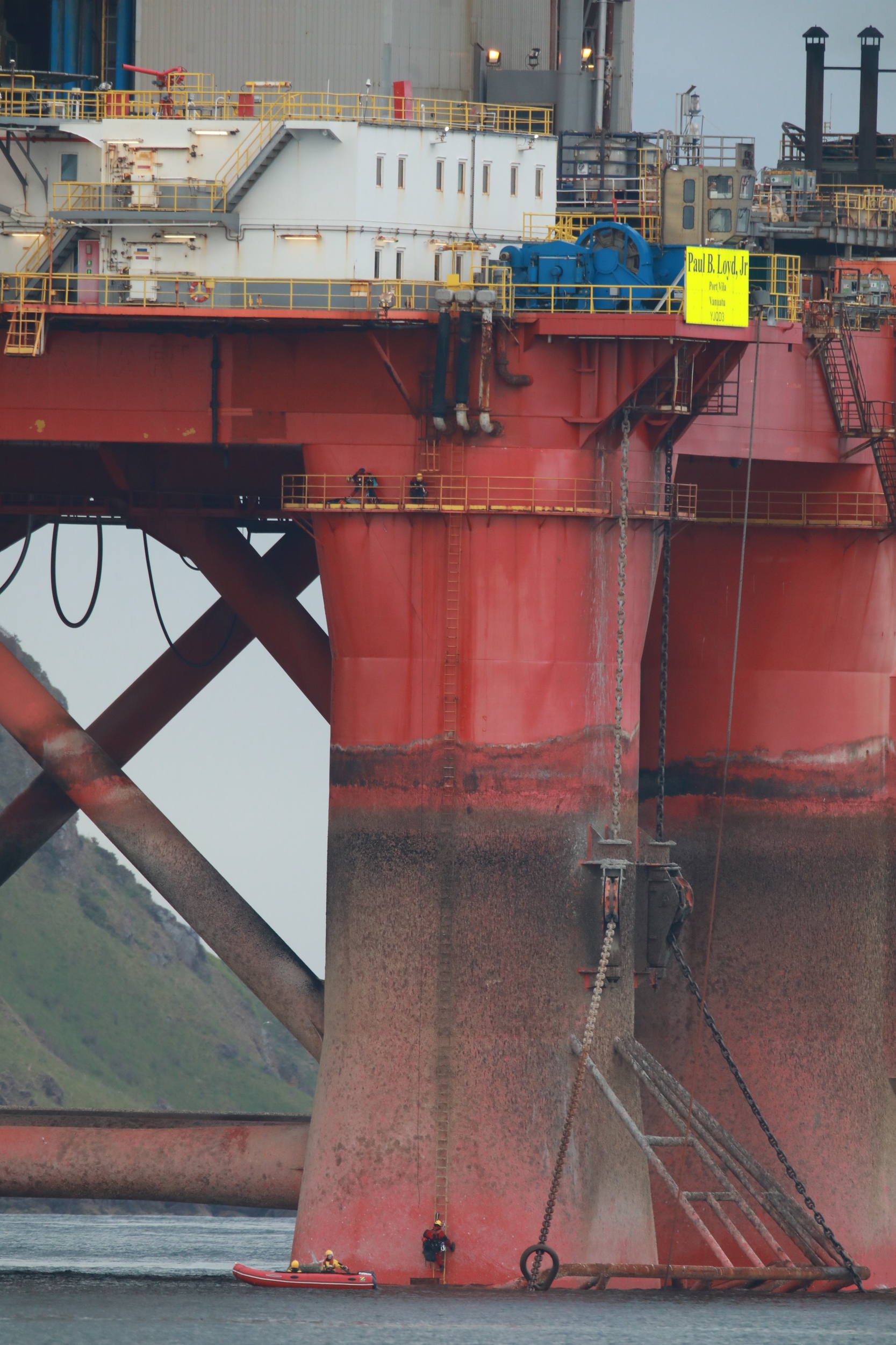 3 Greenpeace activists climbing on to a oil rig - believed to be operated by BP - in Cromarty Firth, Scotland (Greenpeace/PA)