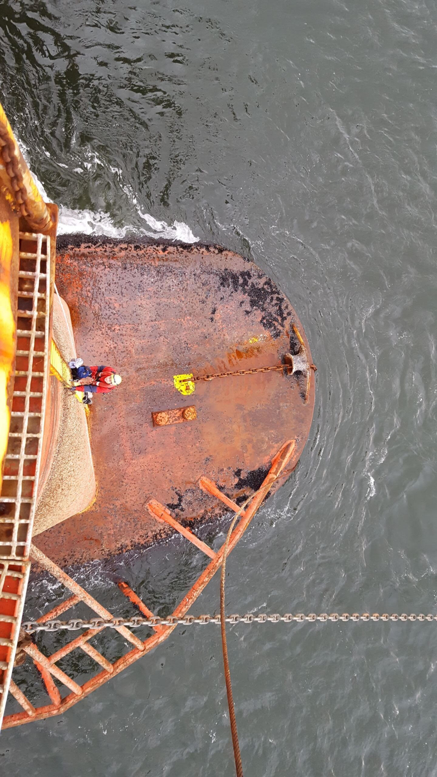 Greenpeace climbers on the BP oil rig in Cromarty Firth