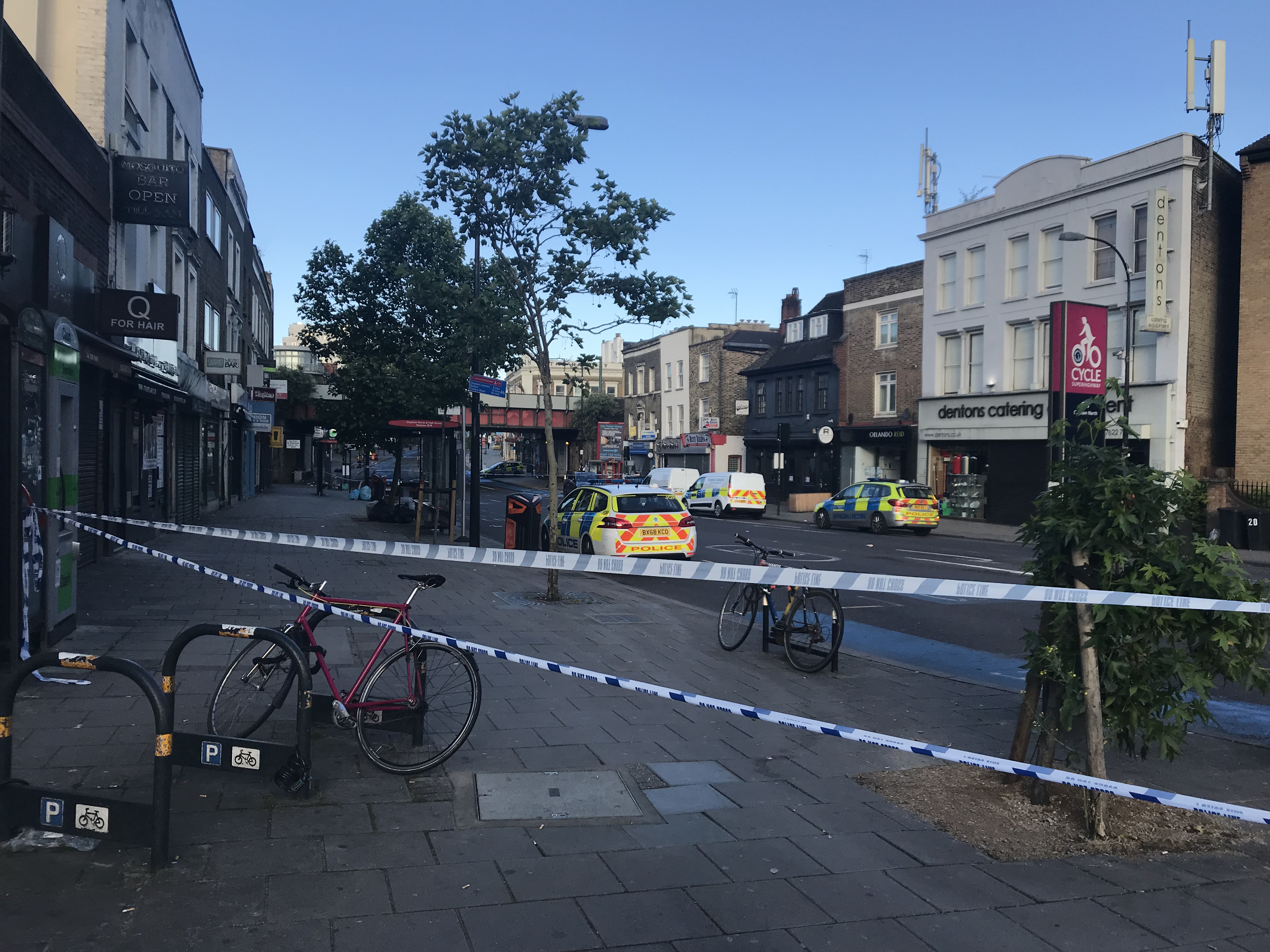 Three men were found suffering from stab and slash injuries in Clapham (Emma Bowden/PA)