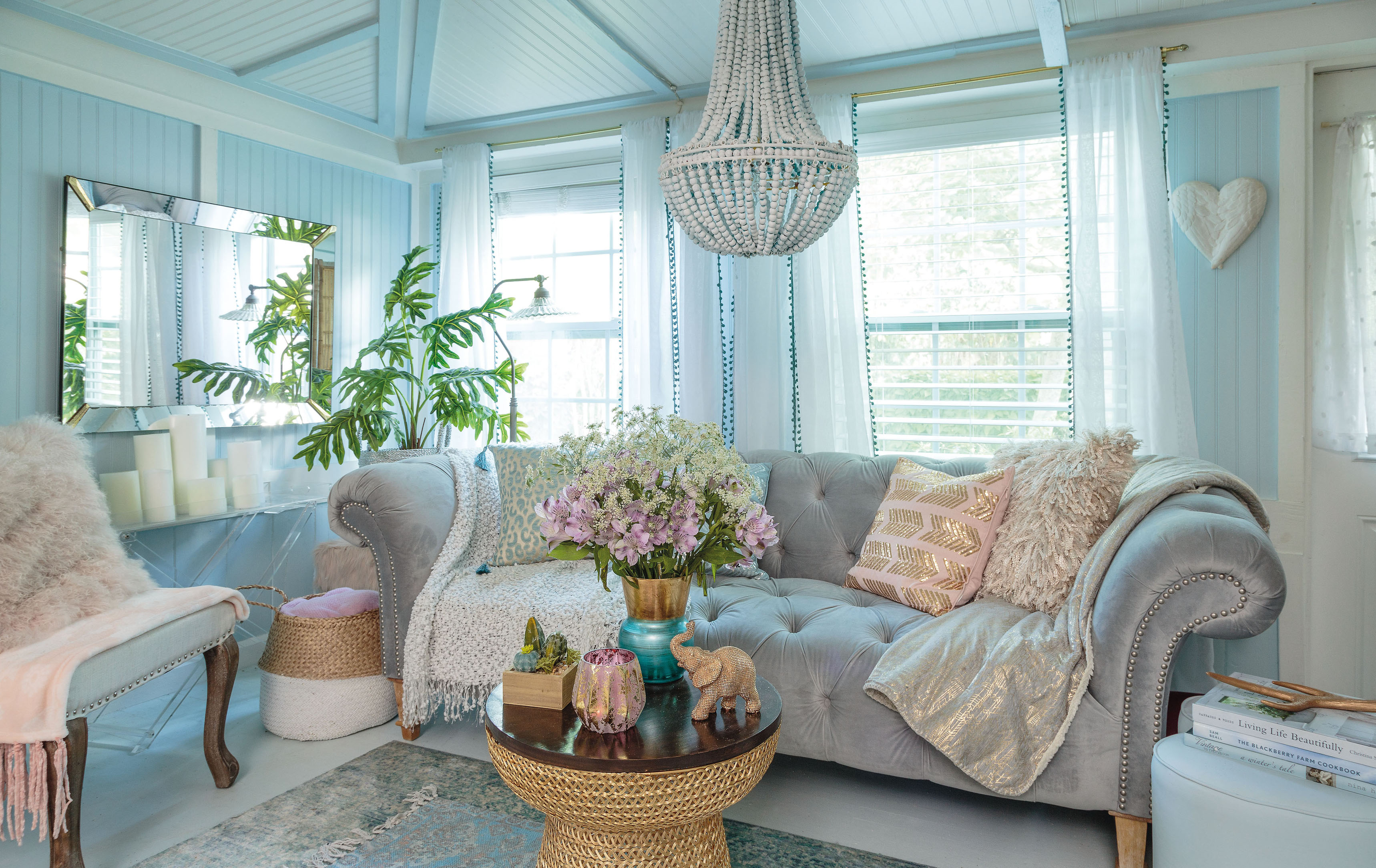 Fifi's own home using a palette of cream, blush pink and aqua creates a soft, feminine feel (Mark Lohman/Global Bohemain/Cico Books/PA).