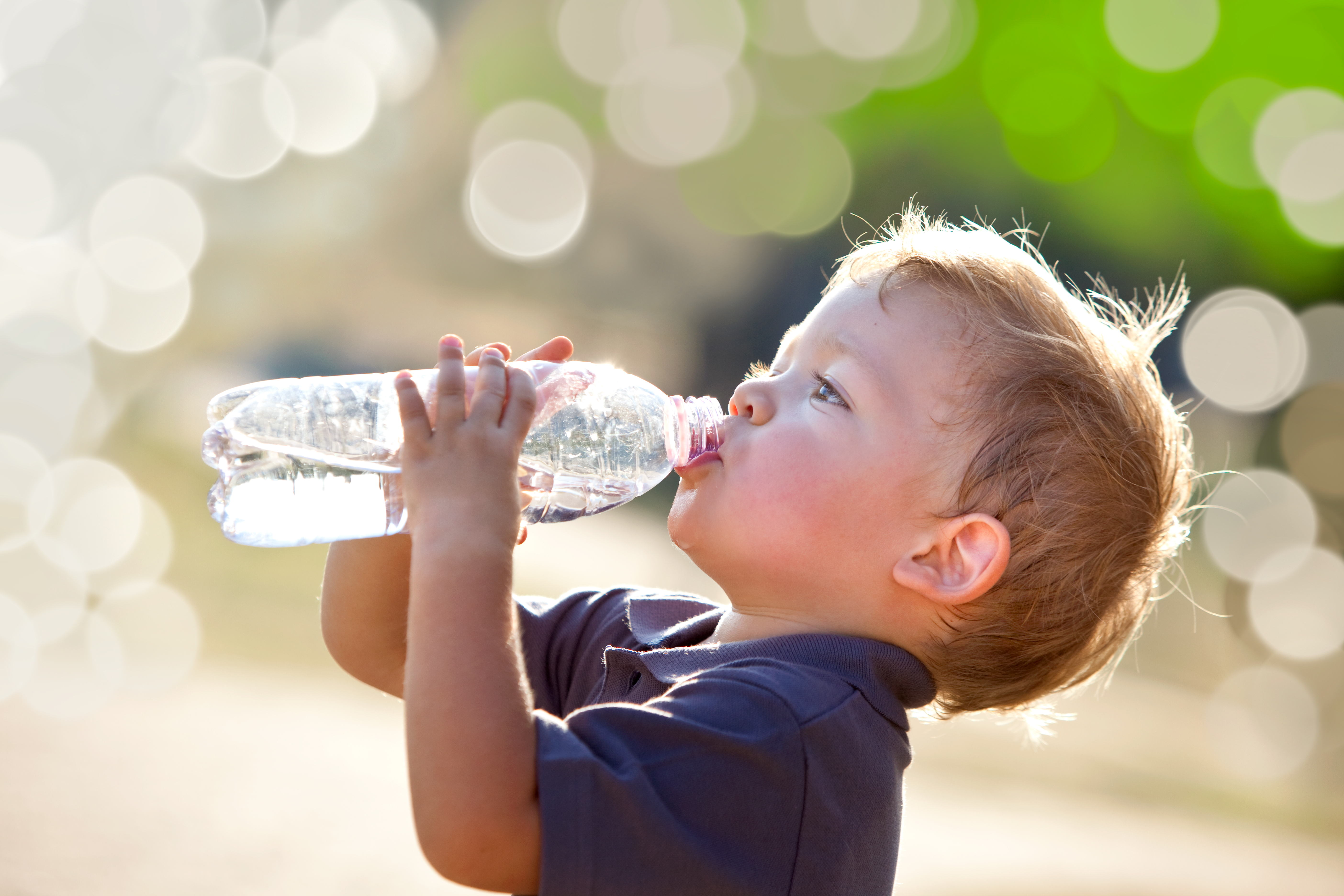 Little boy drinking from a bottle (iStock/PA)