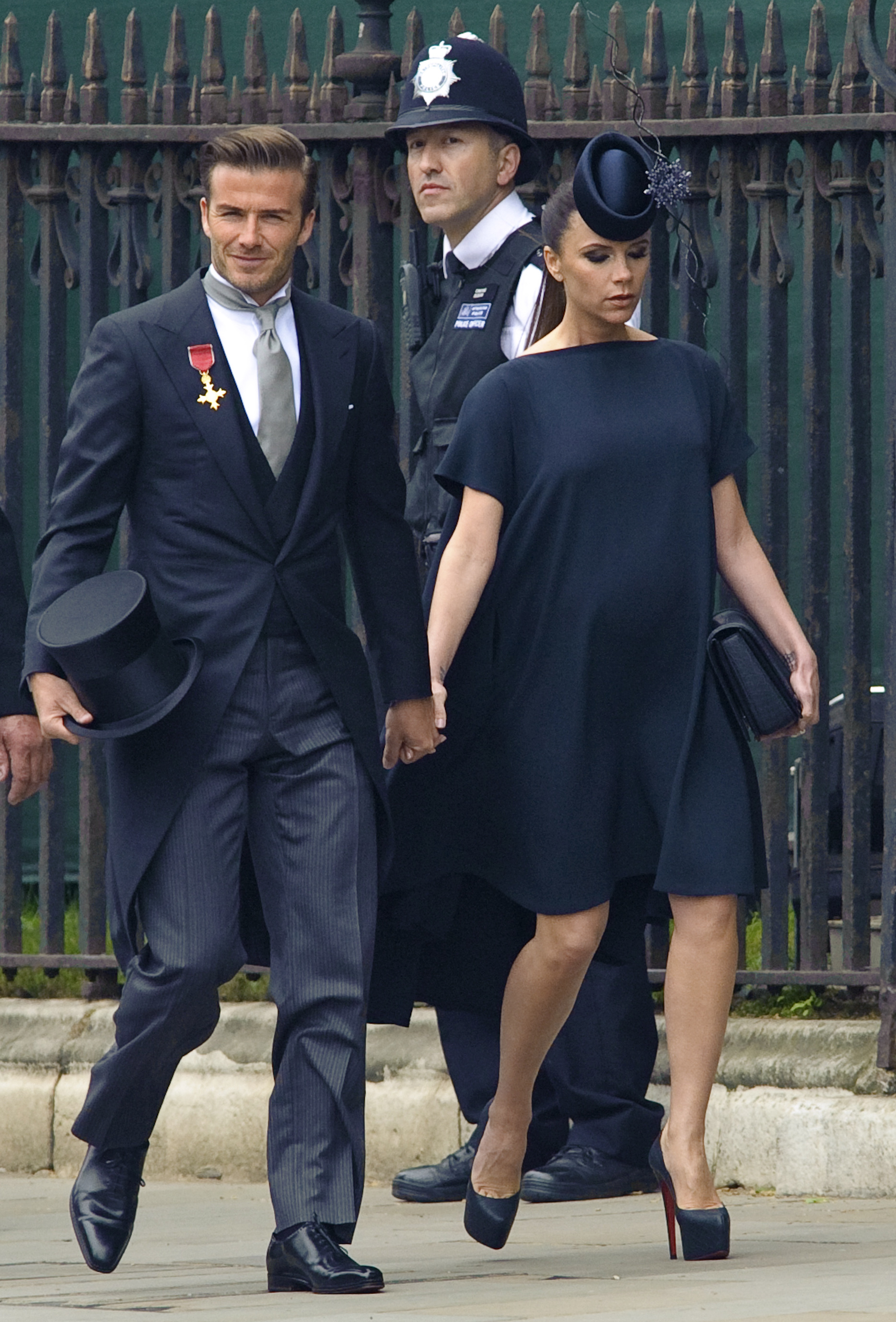 David Beckham and his wife Victoria Beckham arrive at Westminster Abbey for the wedding of Prince William and Kate Middleton