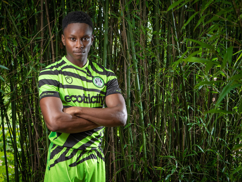 Green zebra-patterned football kit