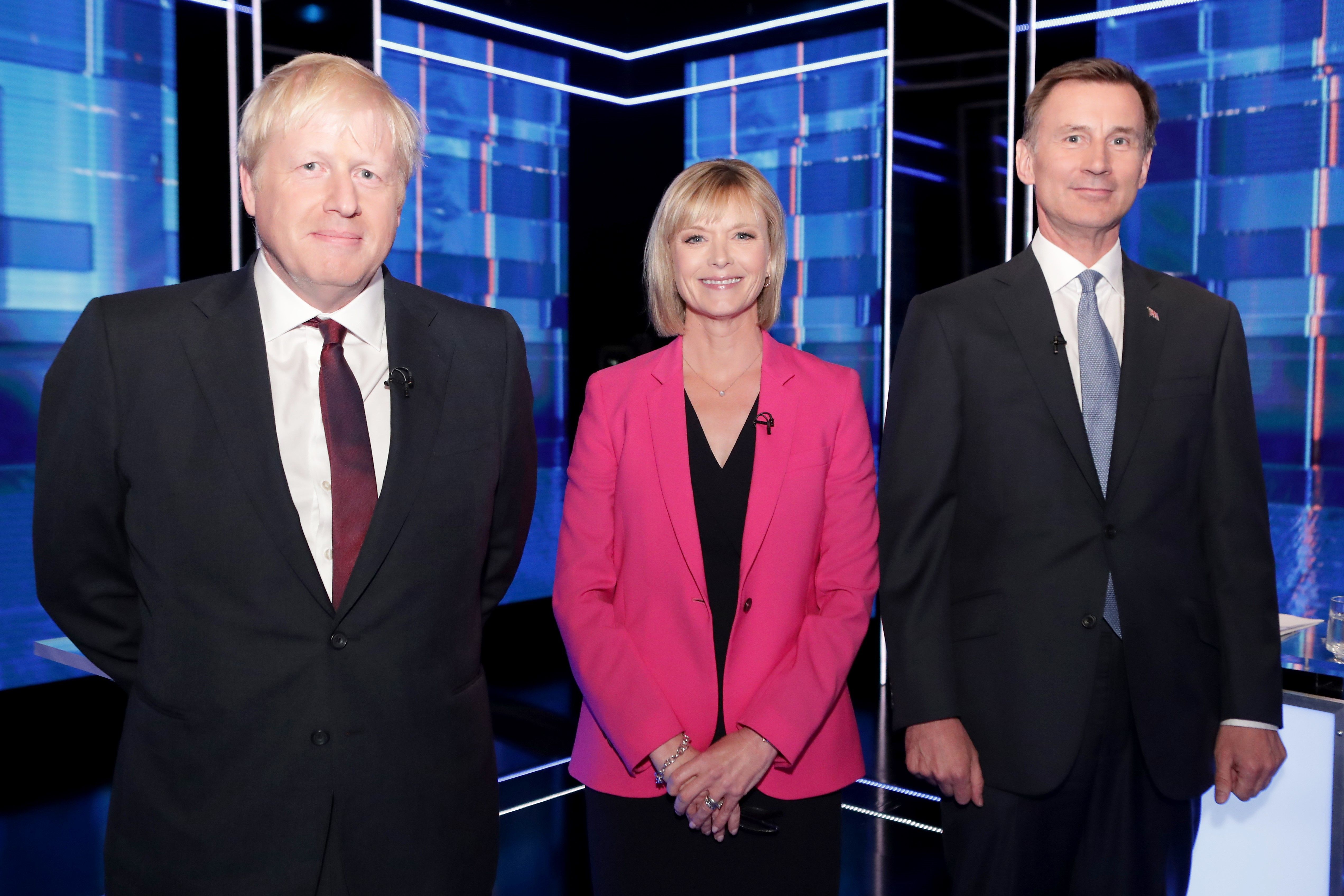 Boris Johnson, left, with moderator Julie Etchingham, centre, and Boris Johnson