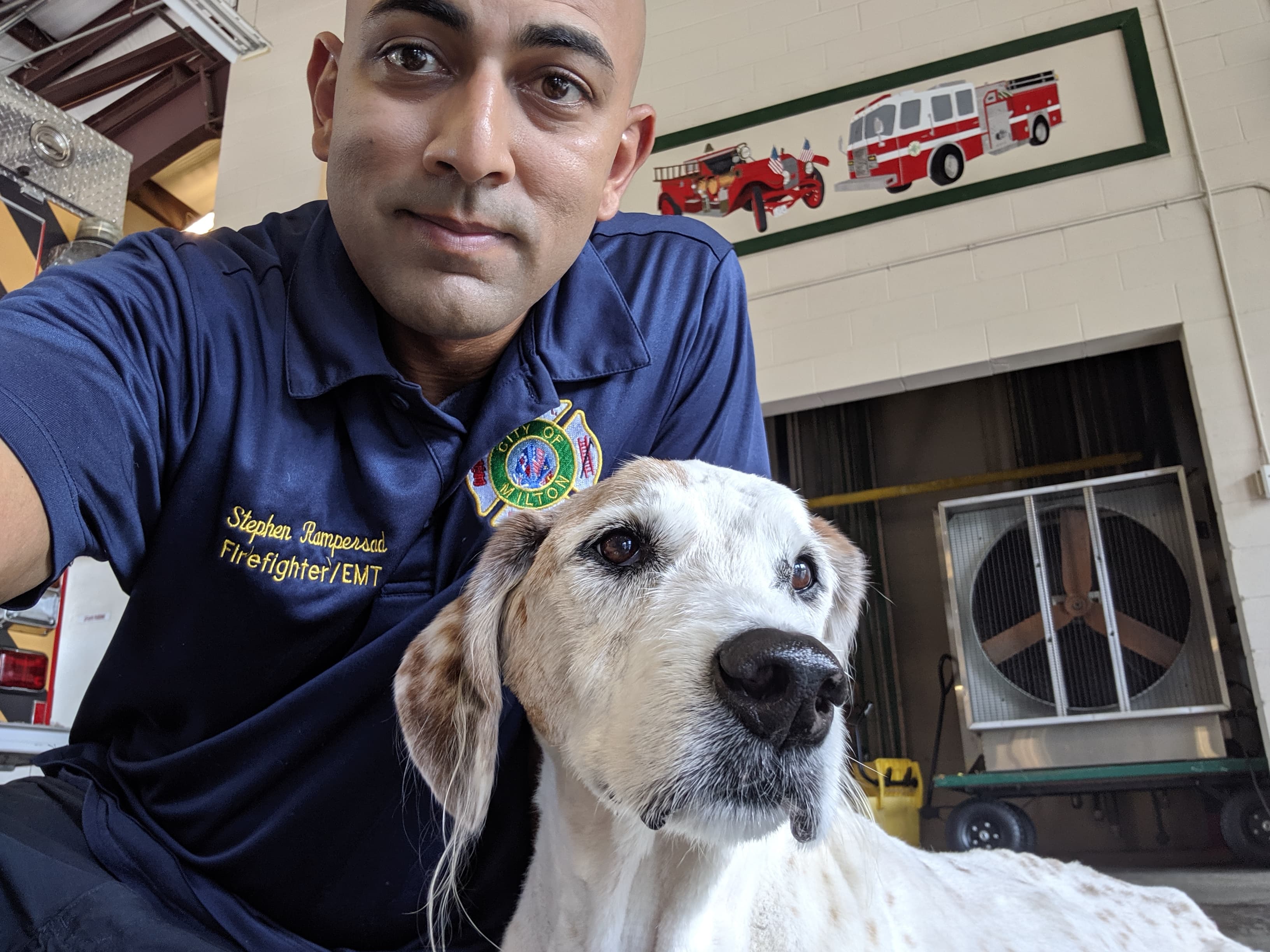 Stephen Rampersad with dog Wilson