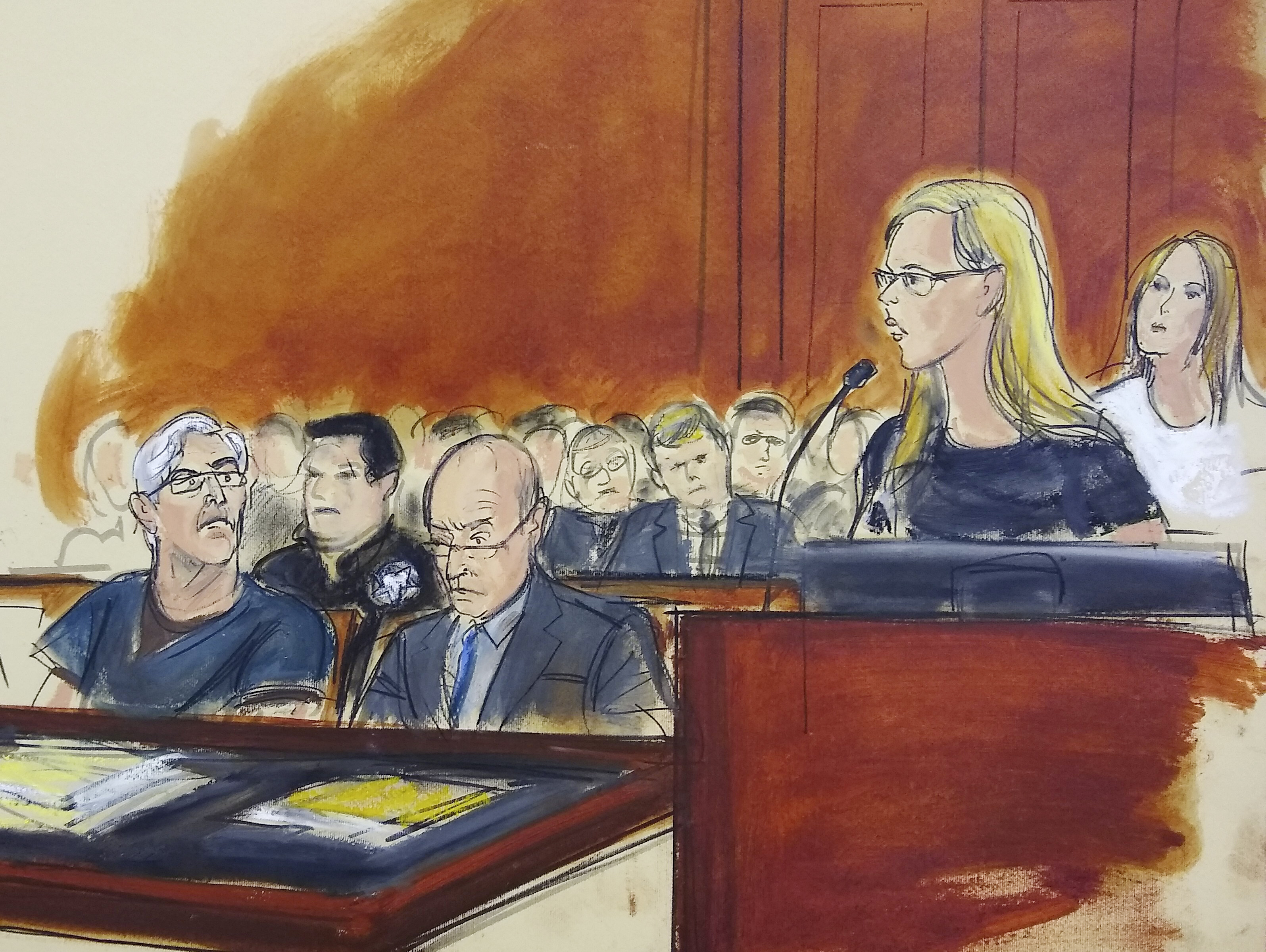 In this courtroom artist's sketch, defendant Jeffrey Epstein, left, listens as accuser Annie Farmer, second from right, speaks