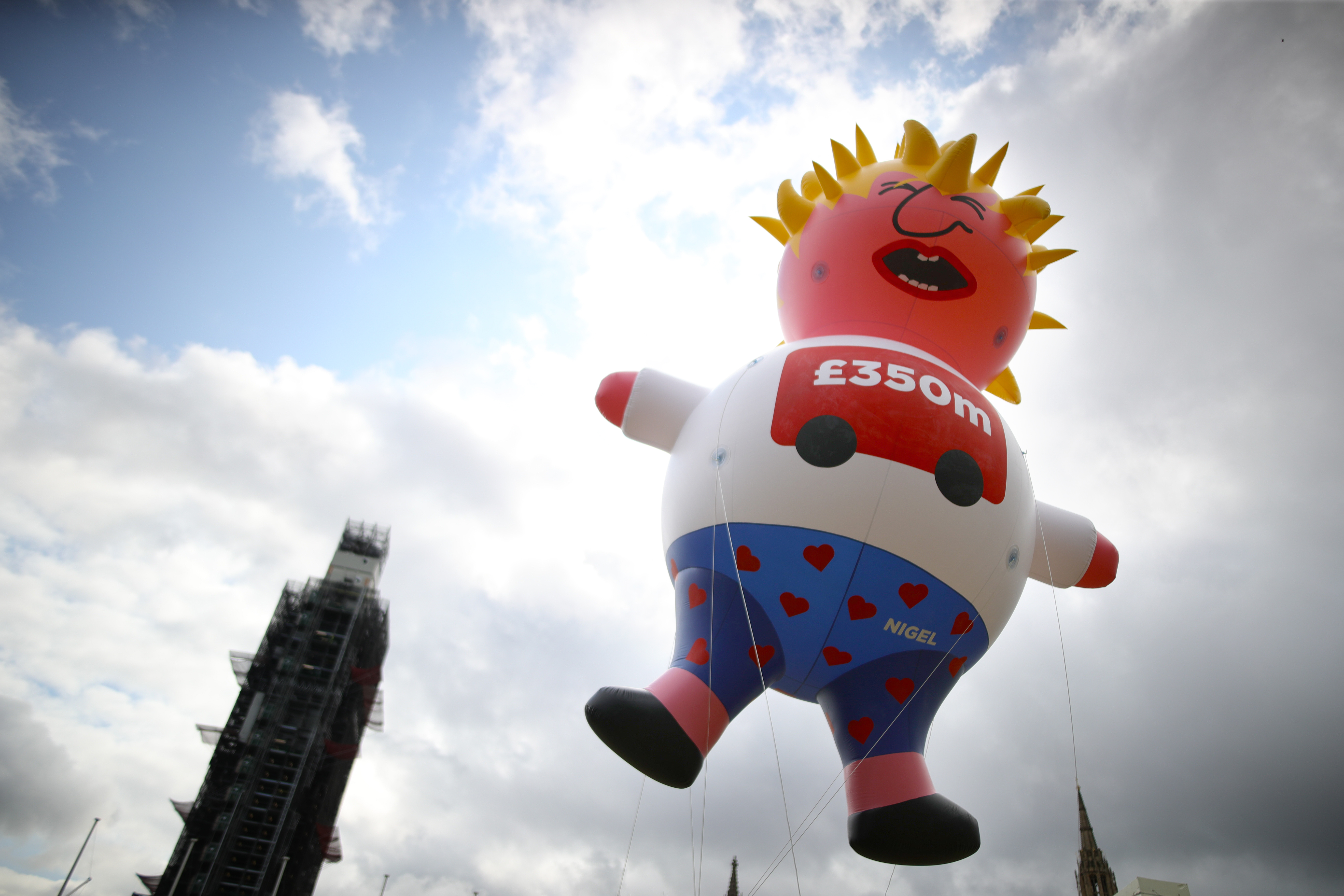 A blimp depicting Boris Johnson is launched in Parliament Square, London, ahead of a pro-European Union a march organised by March for Change. (Aaron Chown/PA)