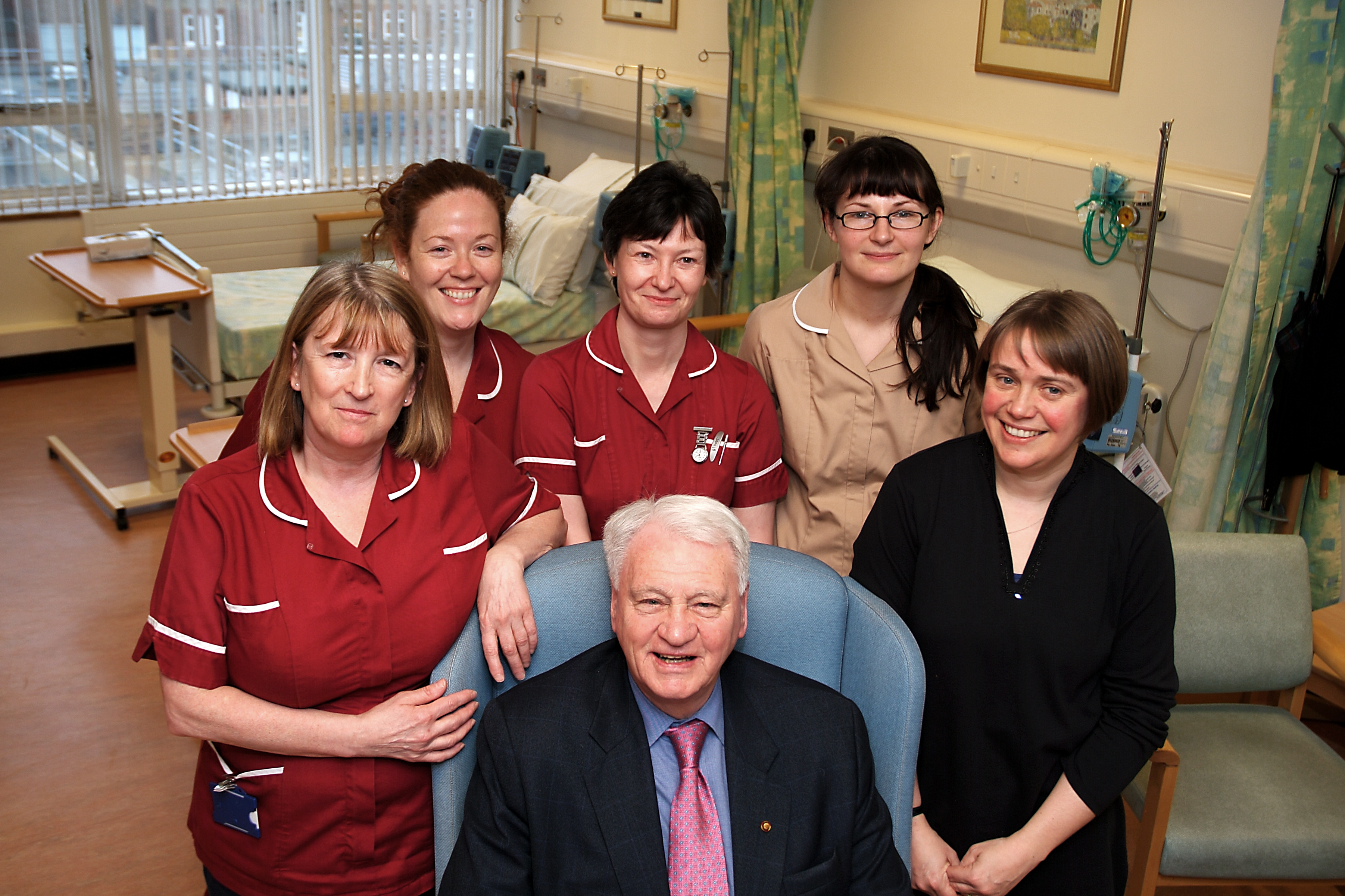 Sir Bobby Robson with staff from the Newcastle Hospitals NHS Trust in 2008. (Sir Bobby Robson Foundation/PA)