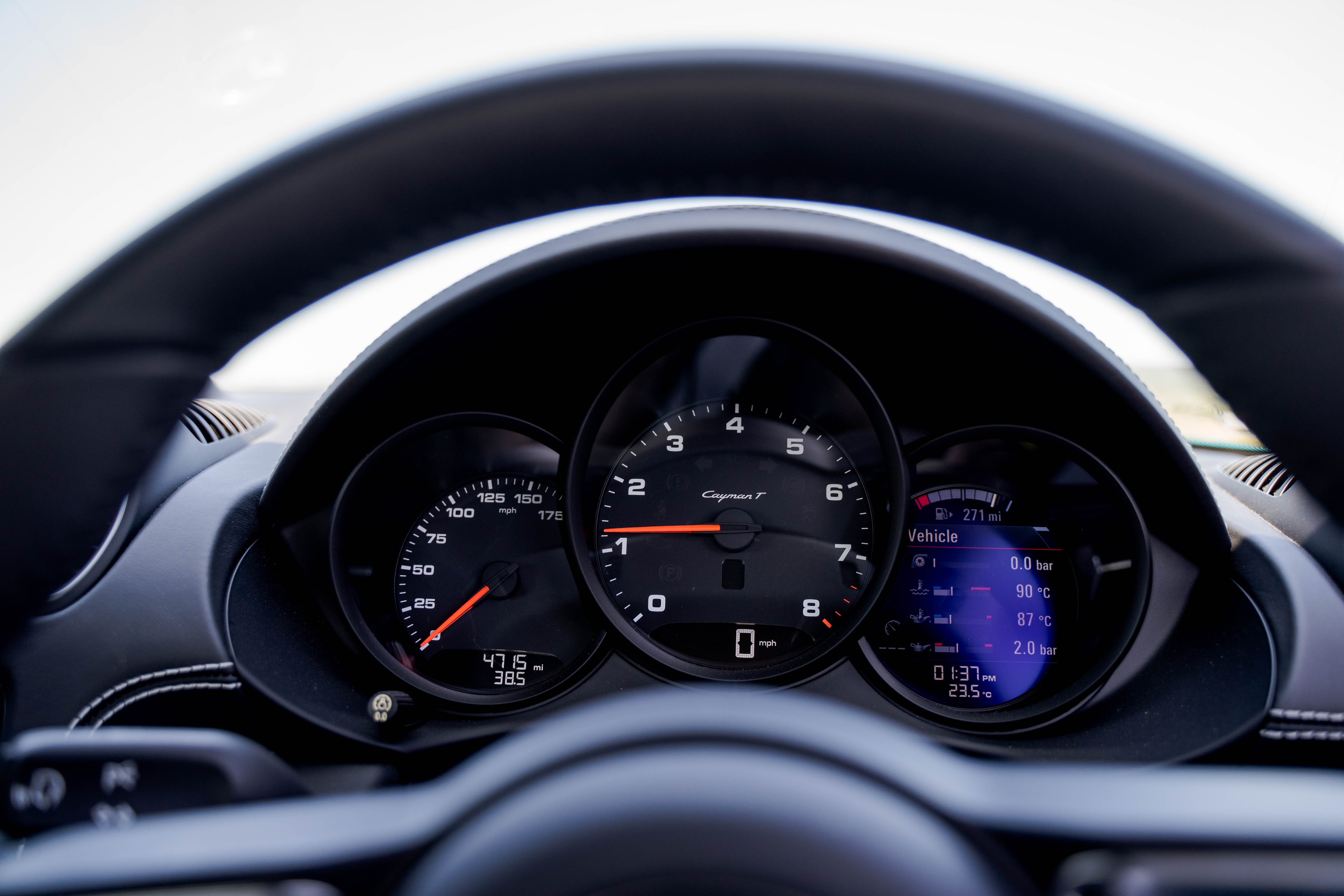 The Porsche's dials are delightfully uncluttered