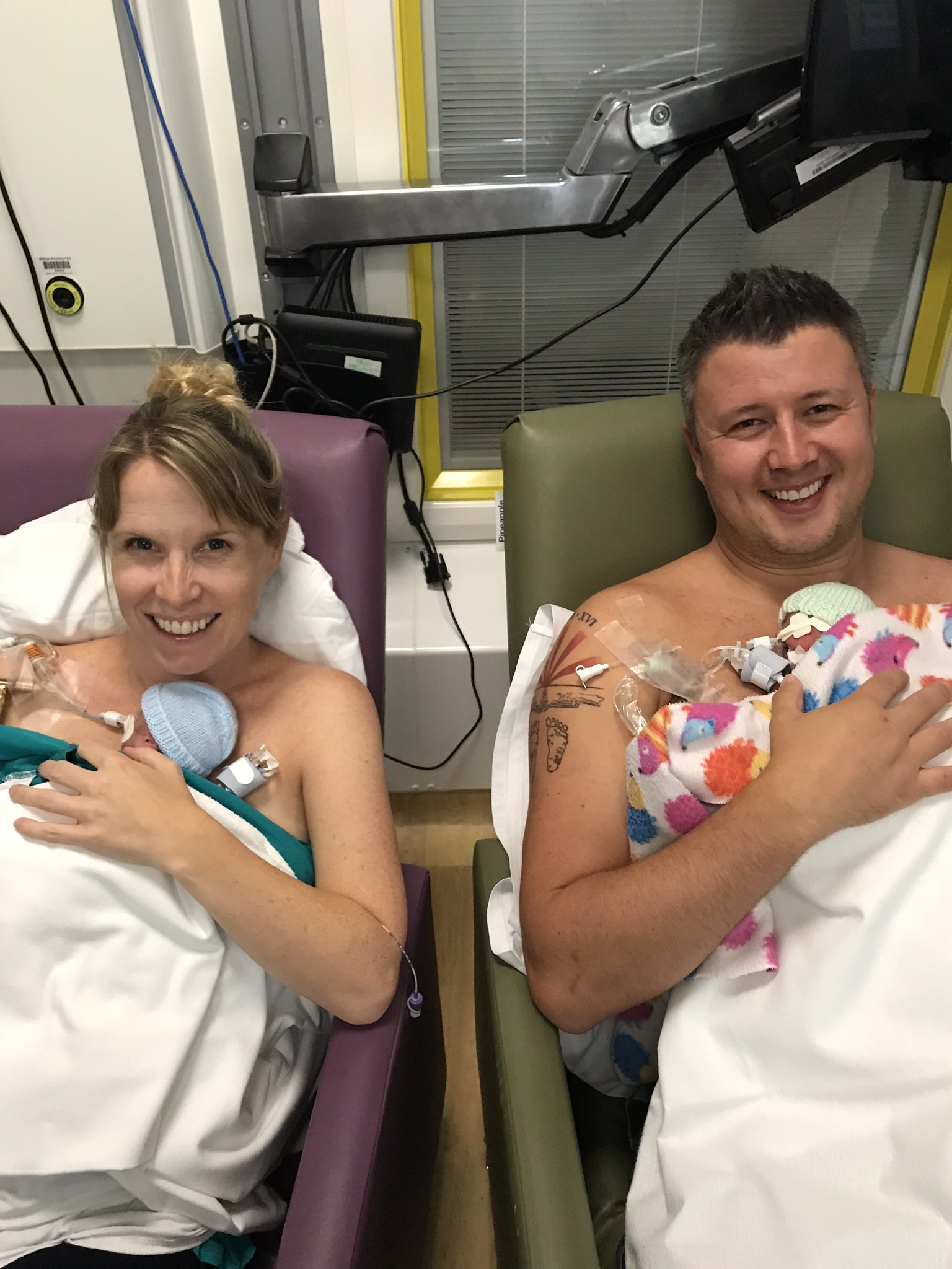 Mr and Mrs Powell with Jenson and Ruben at the John Radcliffe Hospital (Rich Powell/PA).