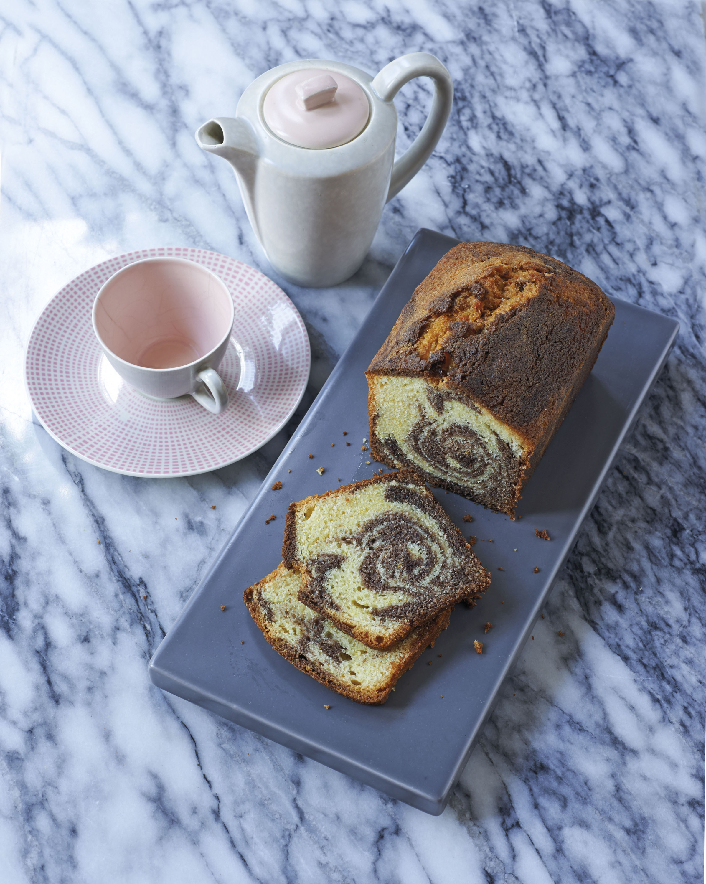 Chocolate and orange marbled loaf cake from Leiths How To Cook Cake by Leith's School of Food and Wine (Quadrille/Peter Cassidy/PA)