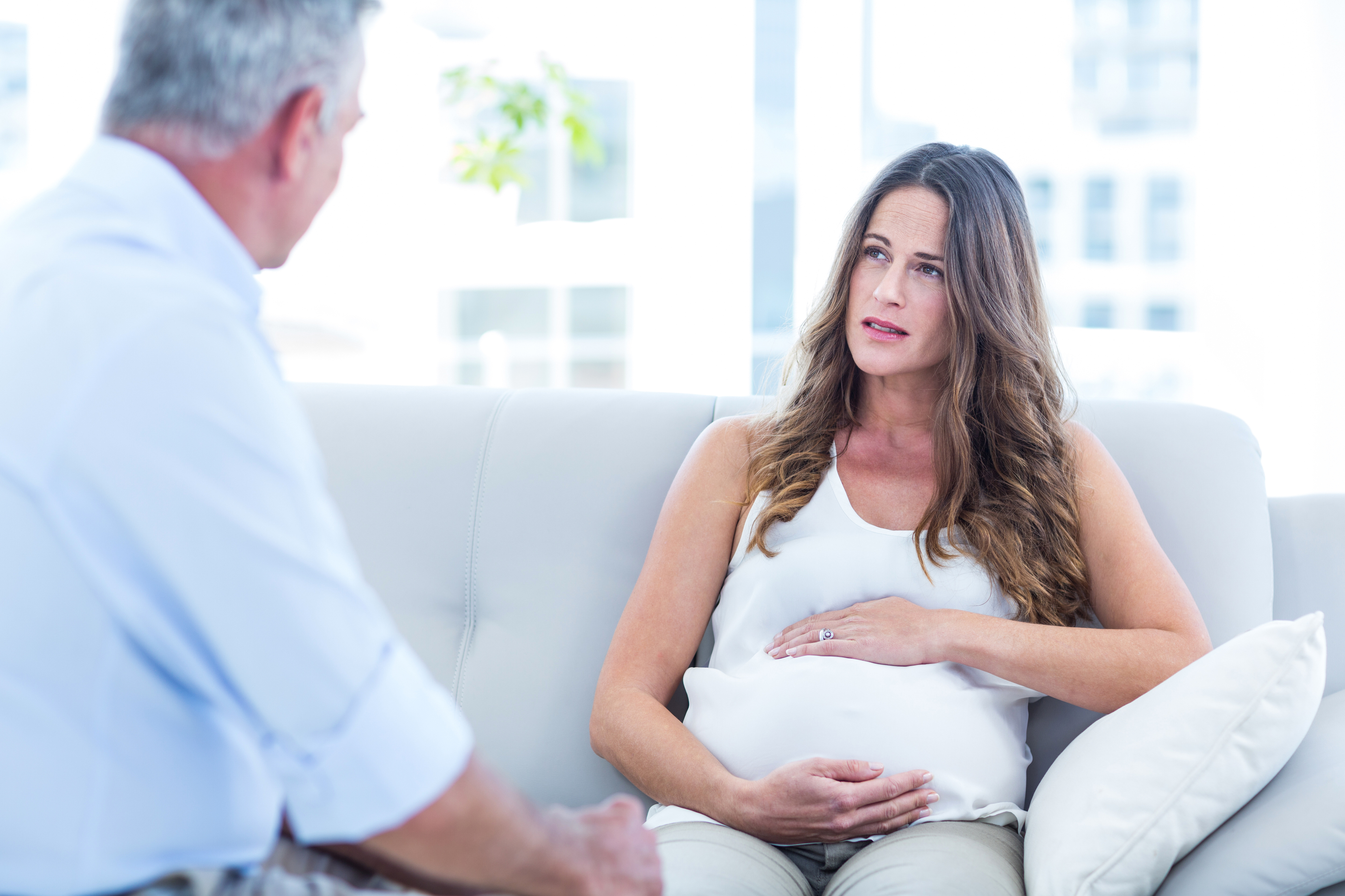 Pregnant woman talking