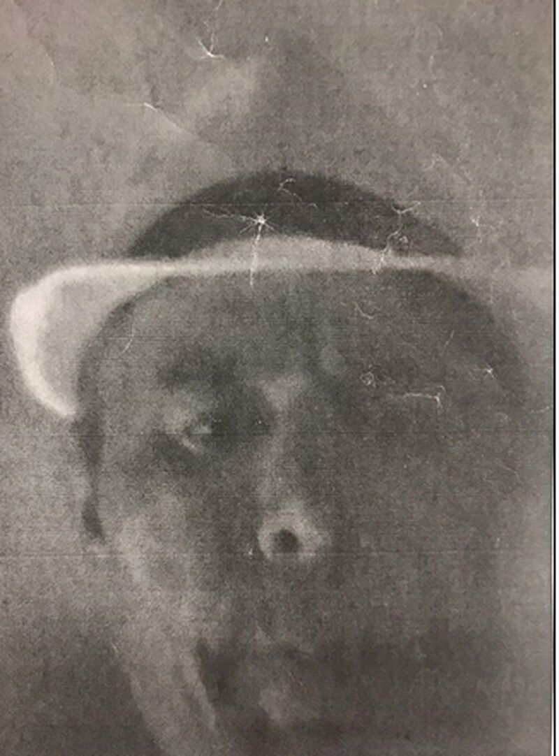 A photocopy of a man's face found in a commercial property